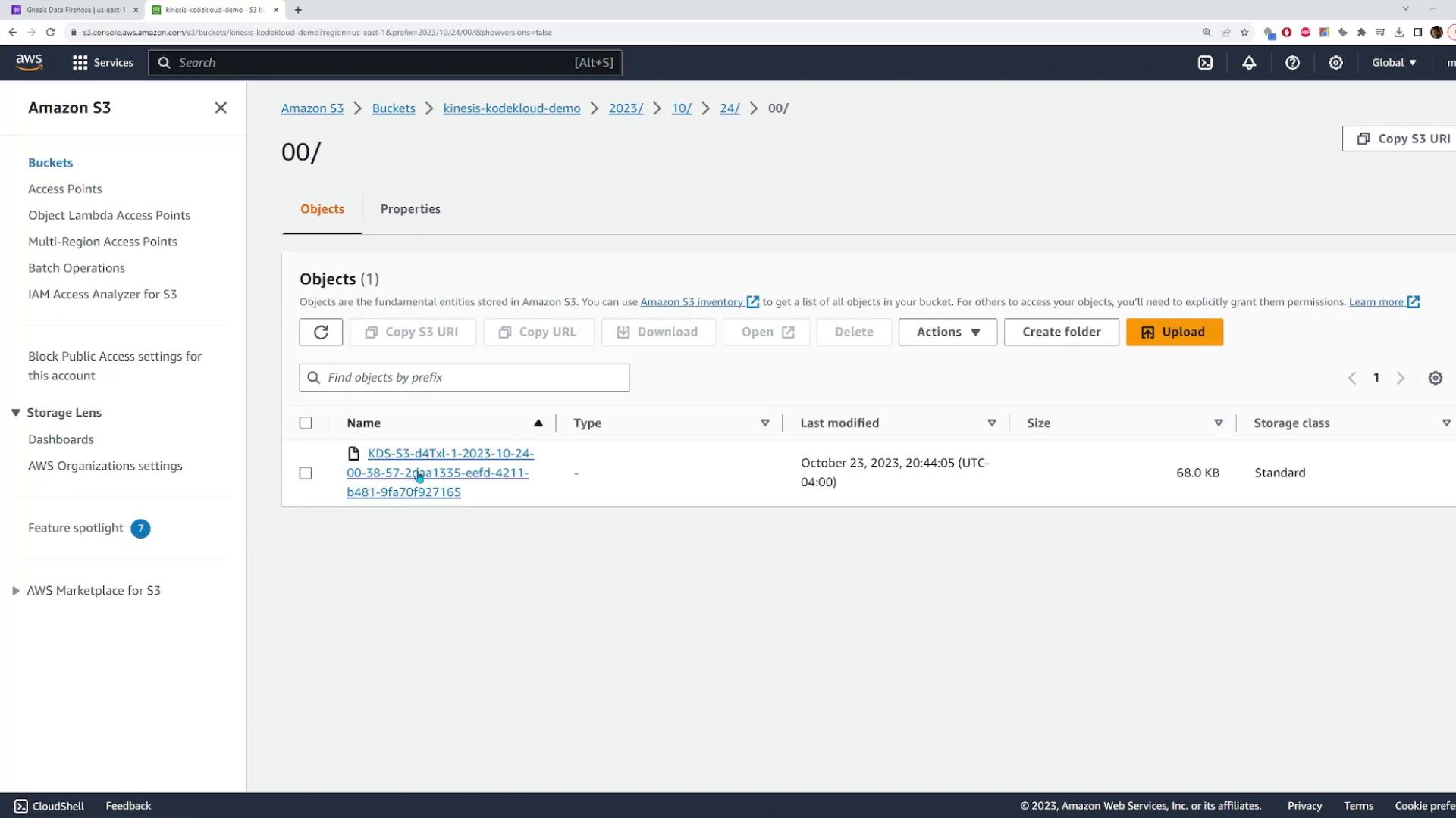 A screenshot of the Amazon S3 web console showing the bucket path (ending in "00/") with one listed object (a KDS-S3 file, 68.0 KB). The UI shows controls like Upload, Create folder, and object actions.