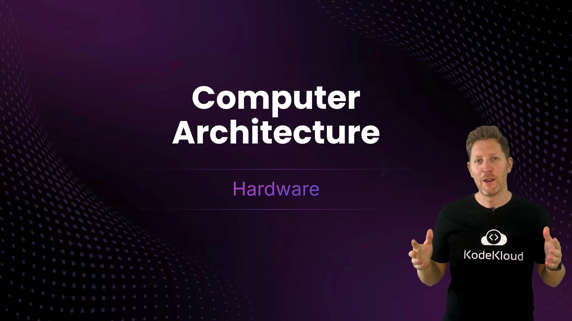 A purple presentation slide titled "Computer Architecture" with the subtitle "Hardware." A presenter stands on the right wearing a black shirt with a "KodeKloud" logo, gesturing with his hands.