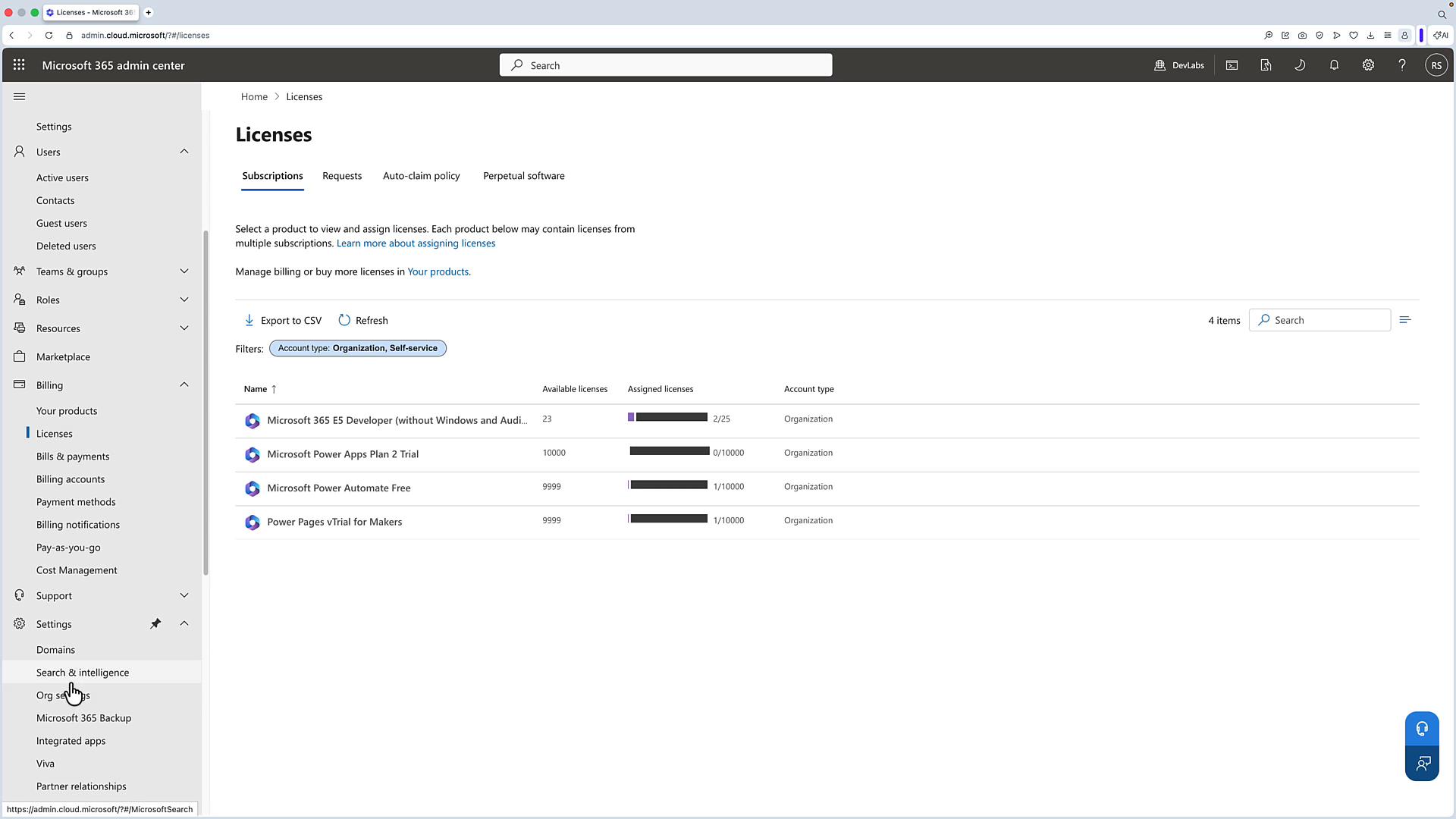 A screenshot of the Microsoft 365 admin center open to the Licenses page. It shows a list of subscriptions (Microsoft 365 E5 Developer, Power Apps Plan 2 Trial, Power Automate Free, Power Pages trial), available/assigned license counts, and the left-hand admin navigation menu.