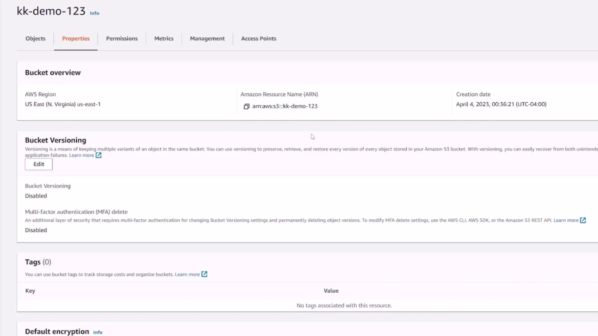 A screenshot of an AWS S3 bucket Properties page for "kk-demo-123" in the US East (N. Virginia) region. It shows the bucket ARN and creation date, with versioning disabled and no tags configured.