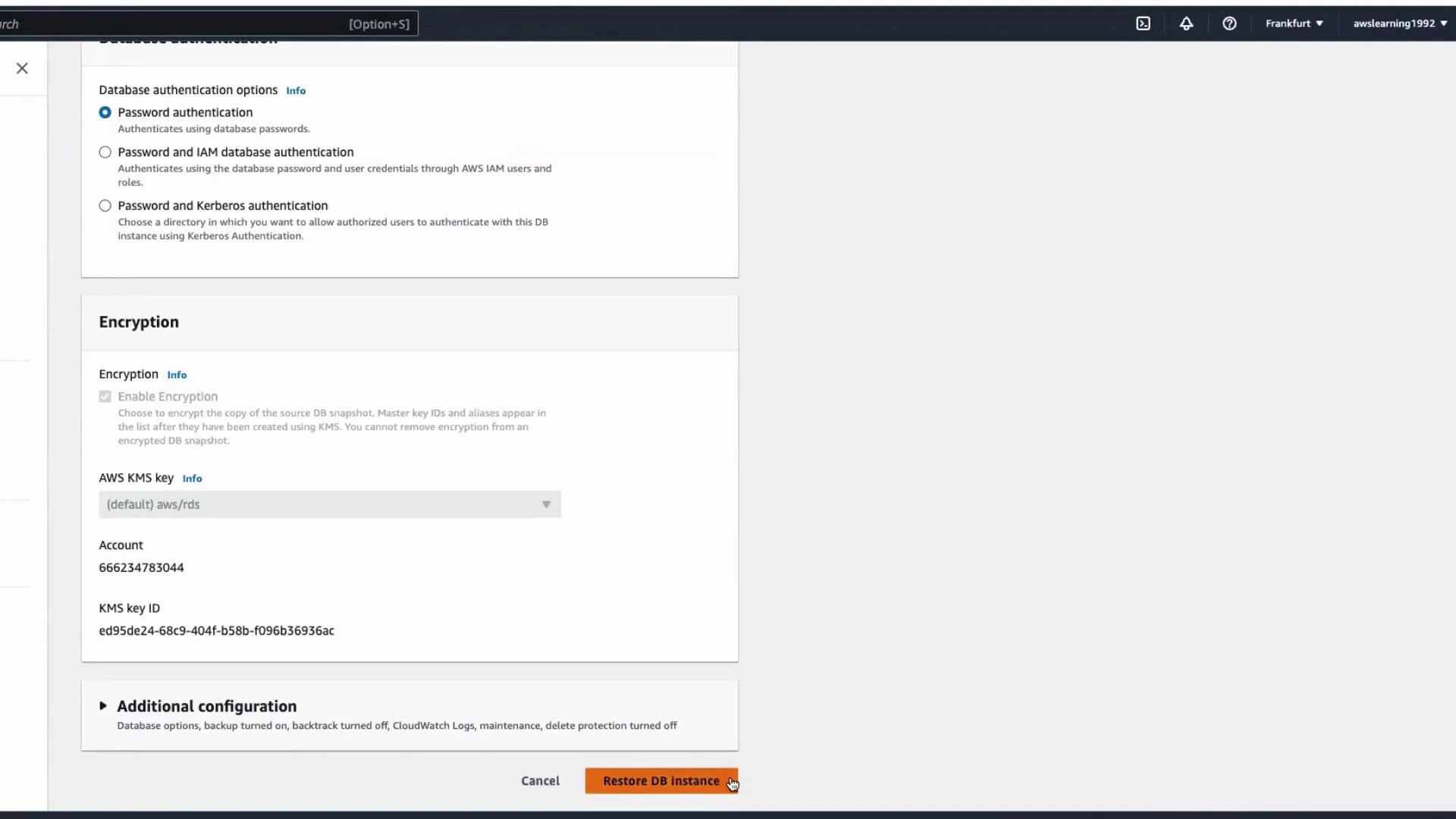 A screenshot of the AWS RDS console showing database authentication and encryption settings for restoring a DB instance. The page displays options for password/IAM/Kerberos authentication, KMS key details, and a "Restore DB instance" button.
