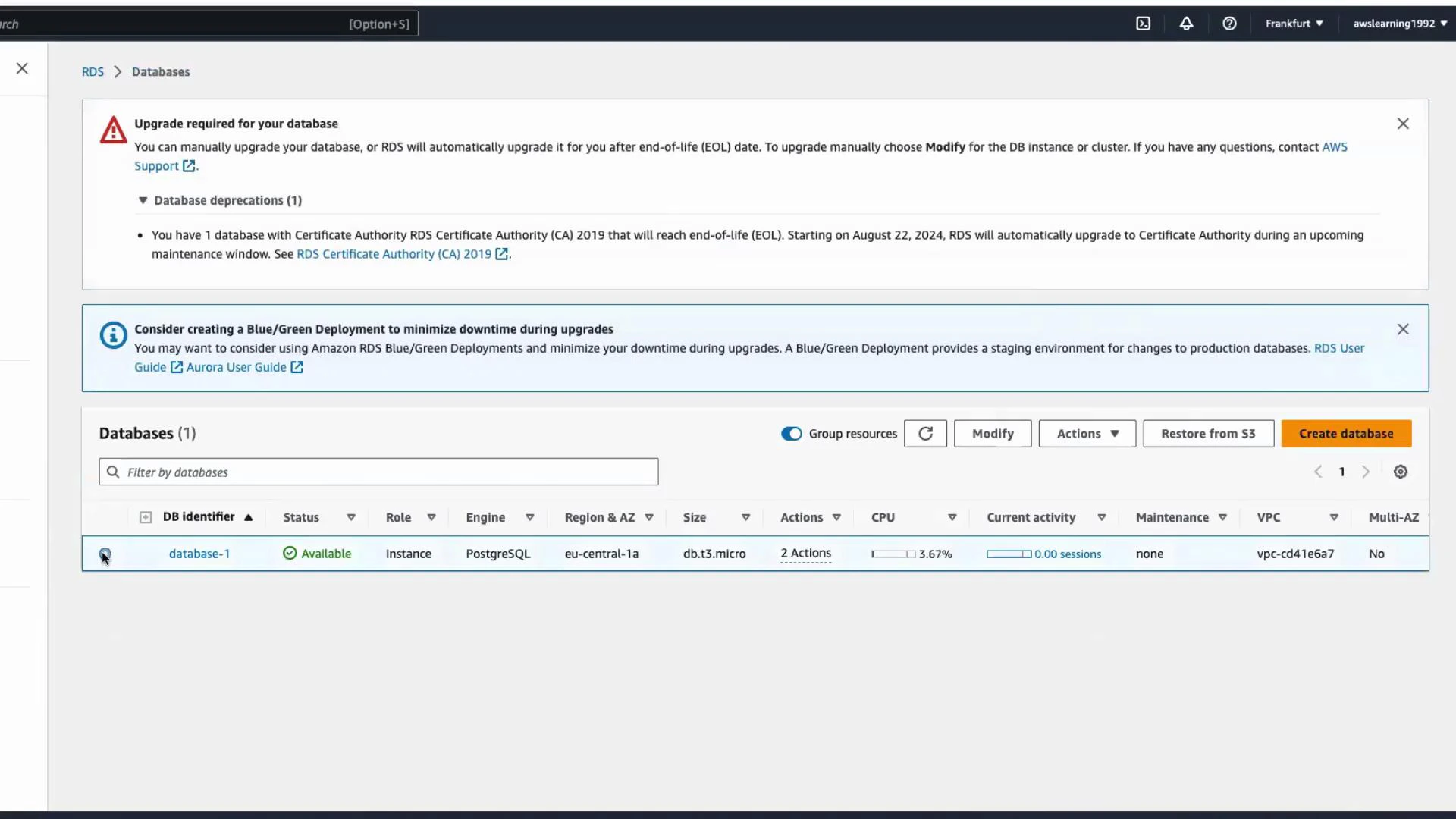 A screenshot of the AWS RDS Databases console showing an "Upgrade required for your database" banner and guidance about blue/green deployments. The table lists one available PostgreSQL instance named "database-1" (db.t3.micro in eu-central-1a).