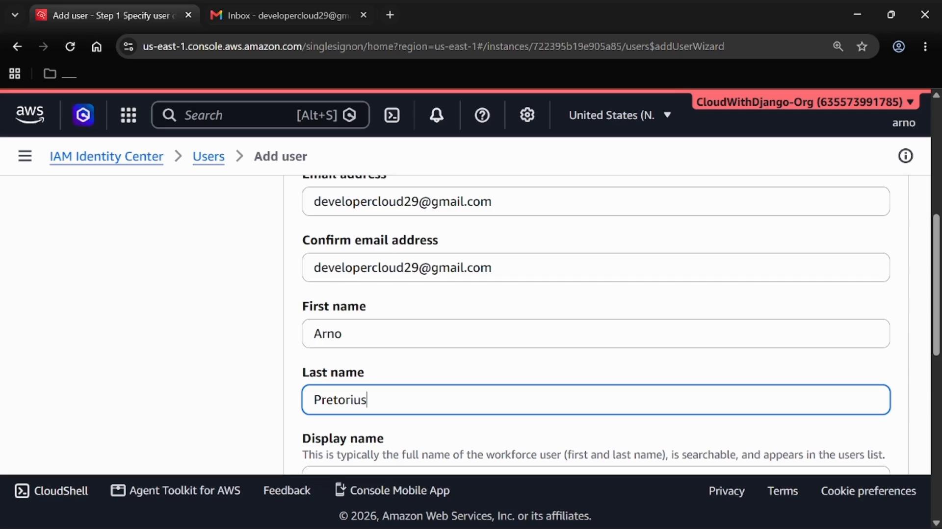 A screenshot of the AWS IAM Identity Center "Add user" form with email, confirm-email and name fields filled in. The browser toolbar and AWS organization header are visible along the top.