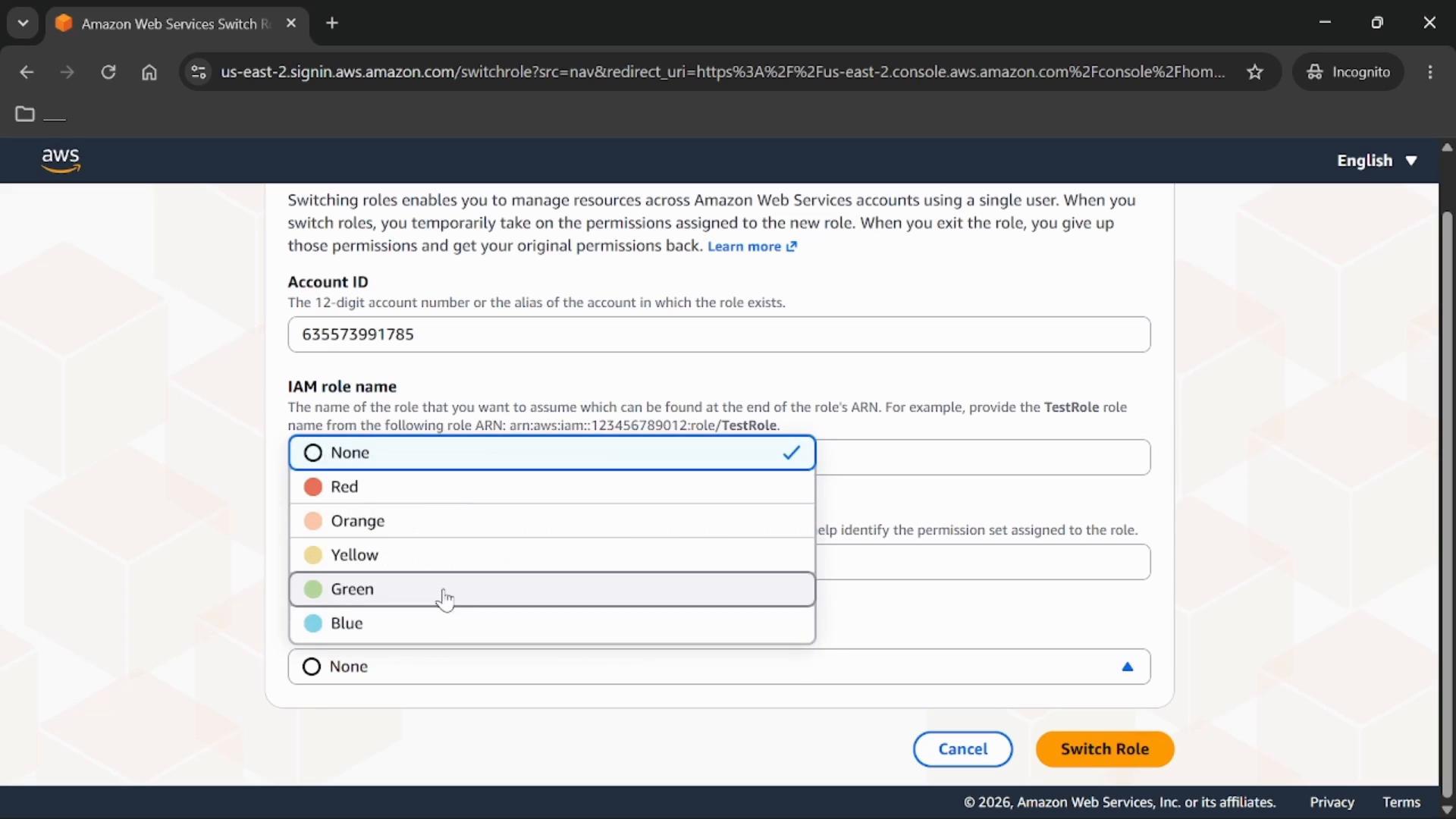 A screenshot of the Amazon Web Services "Switch Role" webpage showing an Account ID field and an IAM role name/color selection dropdown (options like None, Red, Orange, Yellow, Green, Blue). The bottom right shows Cancel and Switch Role buttons.