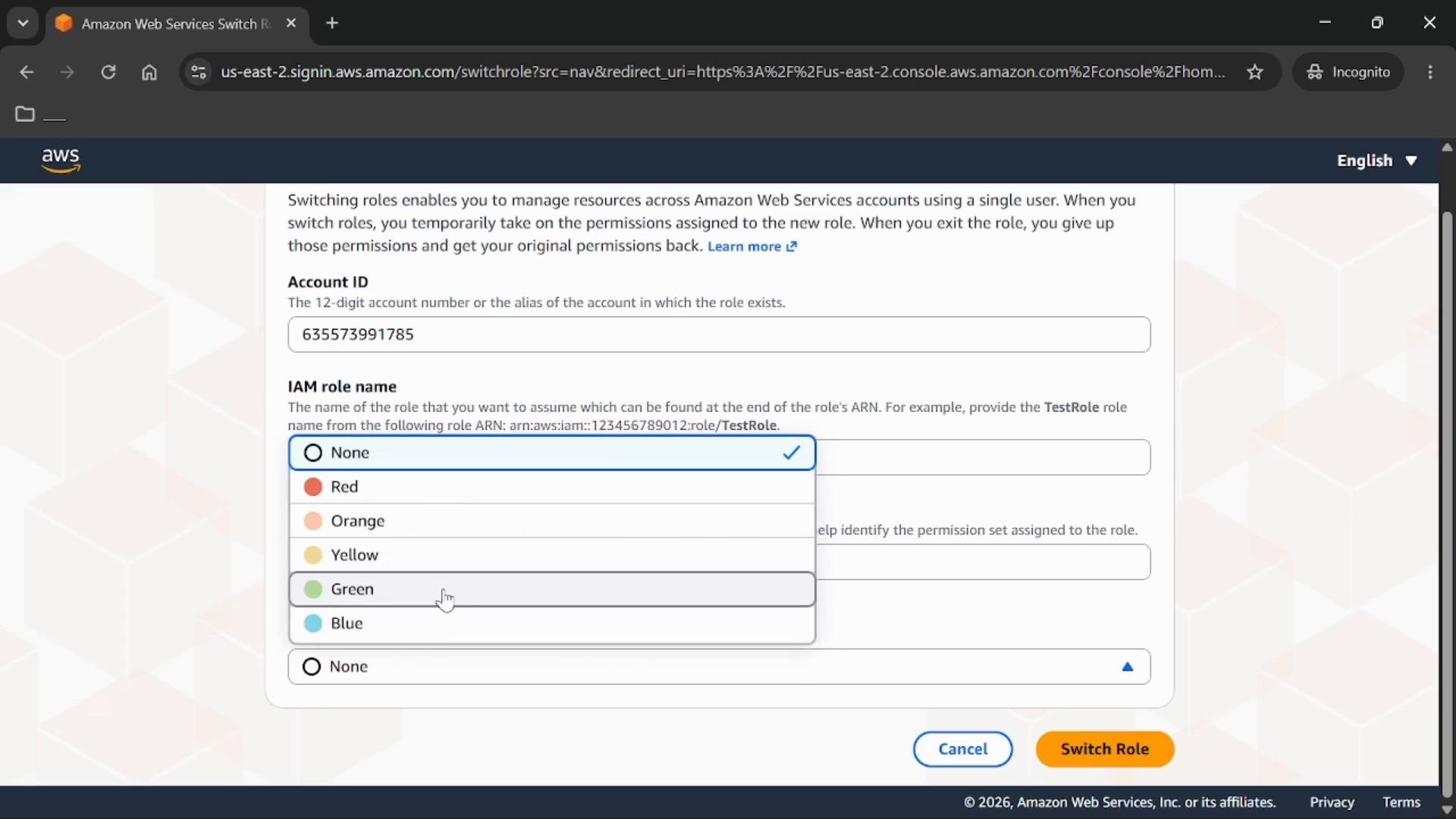 A screenshot of the Amazon Web Services "Switch Role" webpage showing an Account ID field and an IAM role name/color selection dropdown (options like None, Red, Orange, Yellow, Green, Blue). The bottom right shows Cancel and Switch Role buttons.
