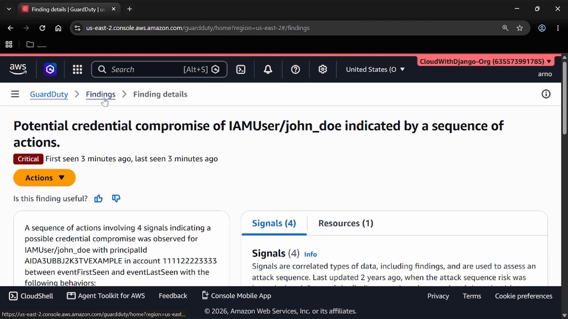 A screenshot of the AWS GuardDuty console showing a critical finding titled "Potential credential compromise of IAMUser/john_doe" with an Actions button. The page displays finding details and tabs for Signals and Resources, and the account/organization name in the header.
