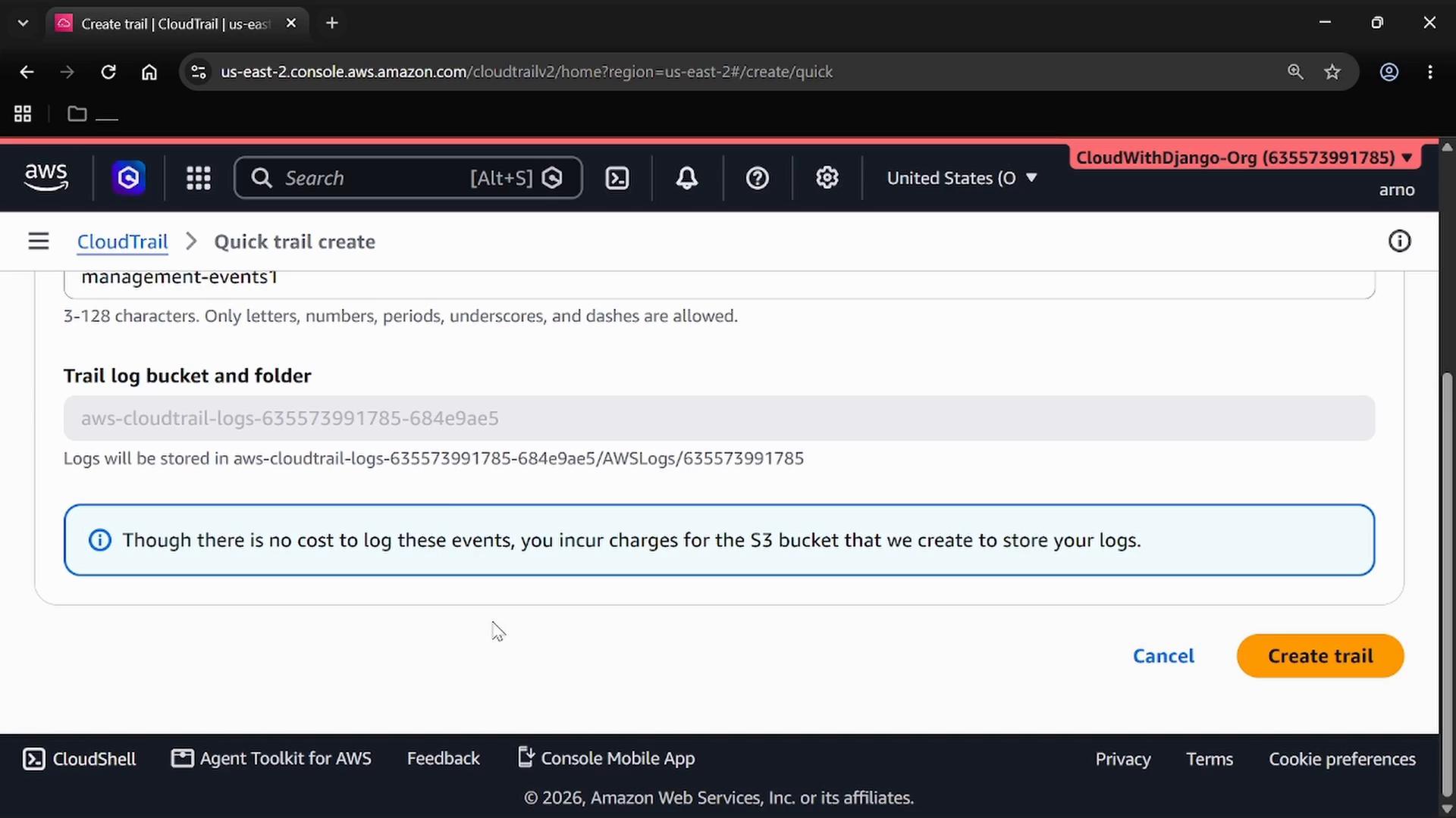 A screenshot of the AWS CloudTrail console on the "Quick trail create" page, showing the trail log bucket/folder field and an informational note that S3 storage may incur charges. The bottom right shows "Cancel" and an orange "Create trail" button.