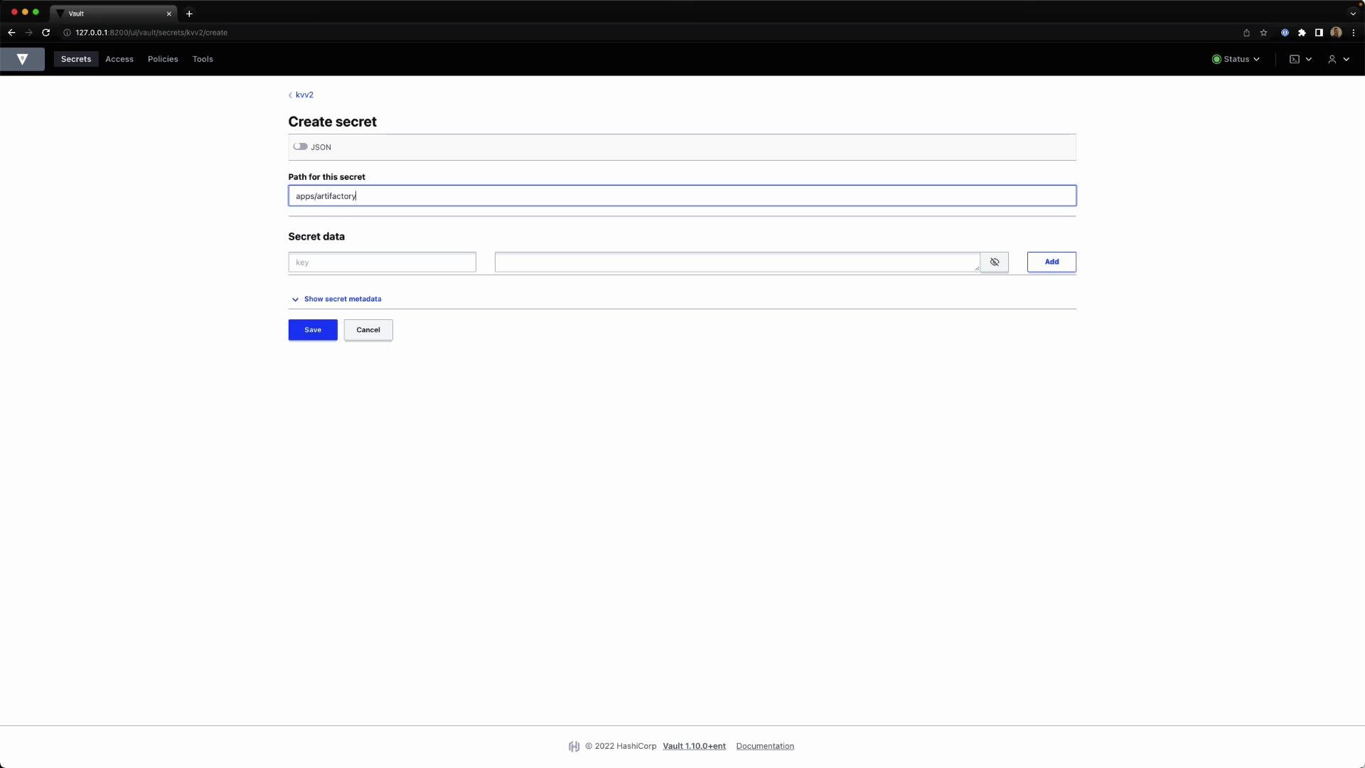 A screenshot of the HashiCorp Vault web UI showing the "Create secret" form (kv v2) with the path set to "apps/artifactory" and fields for key/value secret data. The page also shows JSON toggle, "Show secret metadata," an Add button for entries, and Save/Cancel controls.