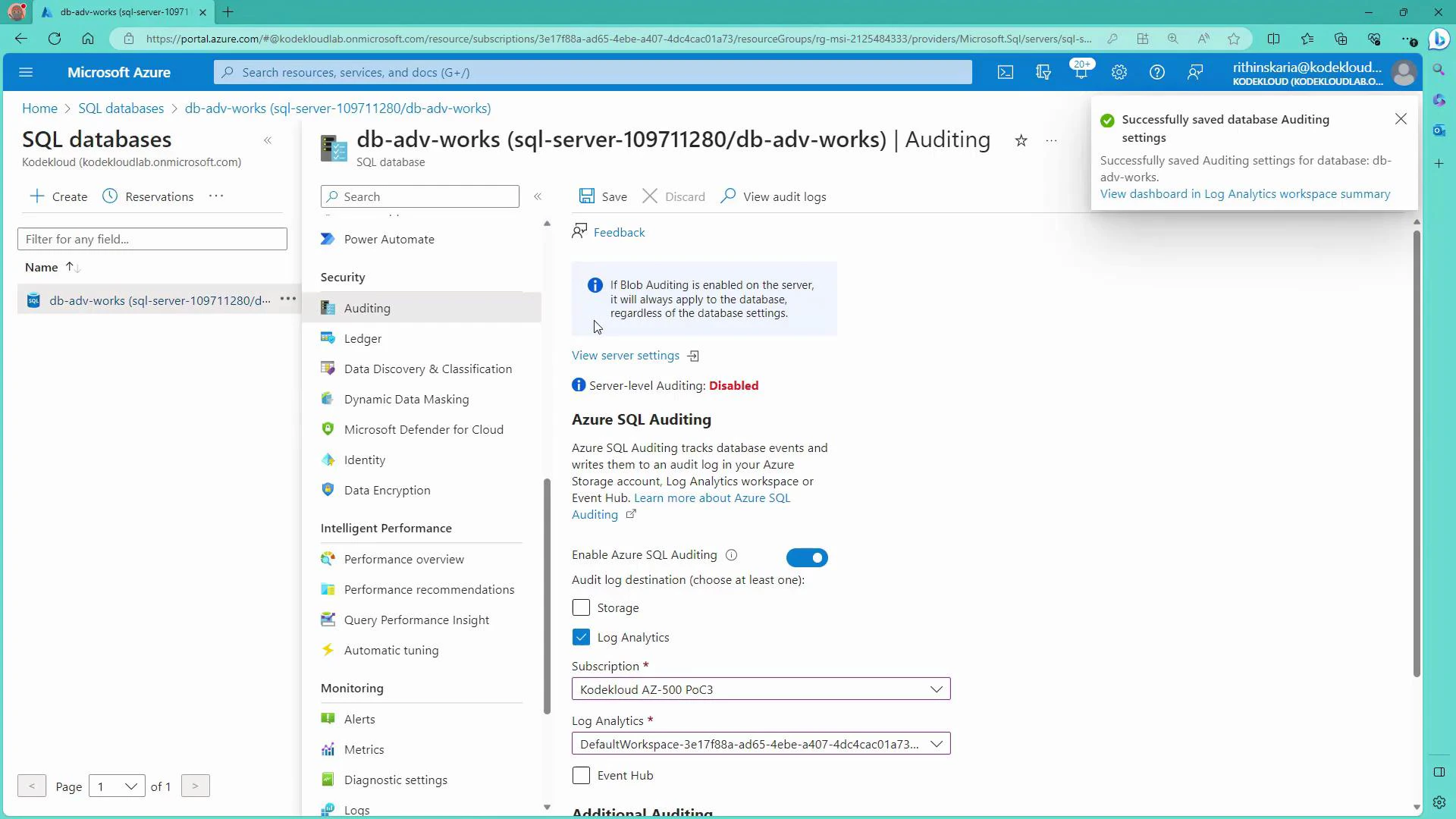 A screenshot of the Microsoft Azure portal showing the SQL database "db‑adv‑works" Auditing settings page with Azure SQL Auditing enabled and Log Analytics selected. A pop-up notification in the top-right confirms the auditing settings were successfully saved.