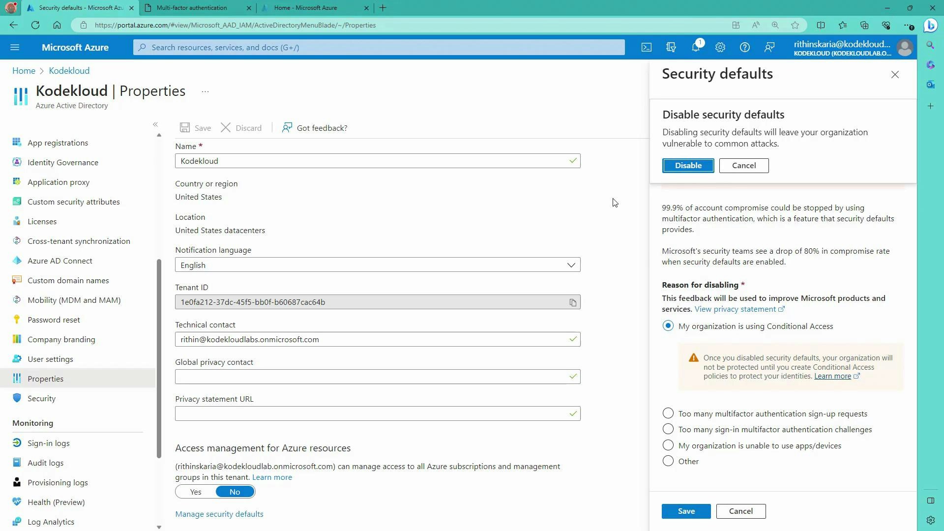 A screenshot of the Microsoft Azure portal showing the "Kodekloud | Properties" page with tenant details (name, country, tenant ID, contacts) on the left. A "Security defaults" sidebar on the right prompts the user to confirm disabling security defaults and choose a reason.