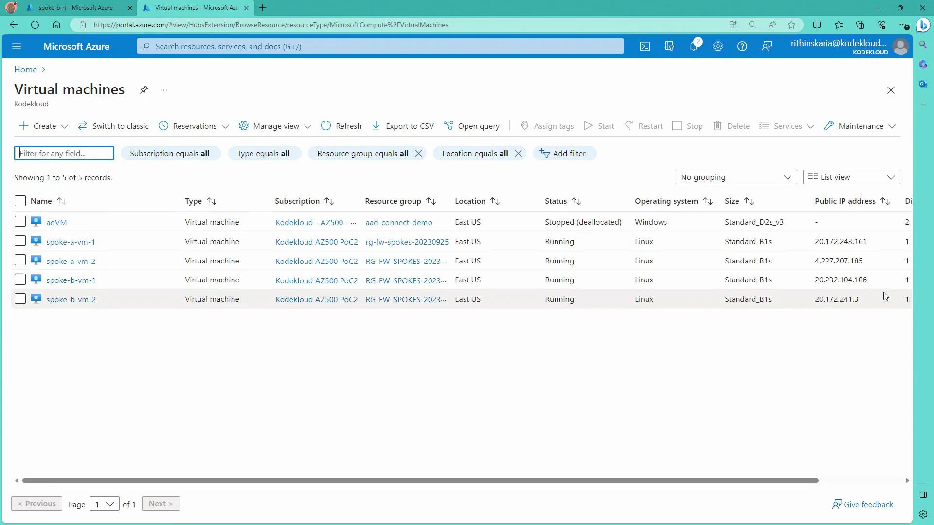 A screenshot of the Microsoft Azure portal showing the "Virtual machines" list with five VMs (adVM, spoke-a-vm-1, spoke-a-vm-2, spoke-b-vm-1, spoke-b-vm-2) including columns for subscription, resource group, location (East US), OS, status, size and public IP. Most VMs are running Linux while adVM is stopped (deallocated).
