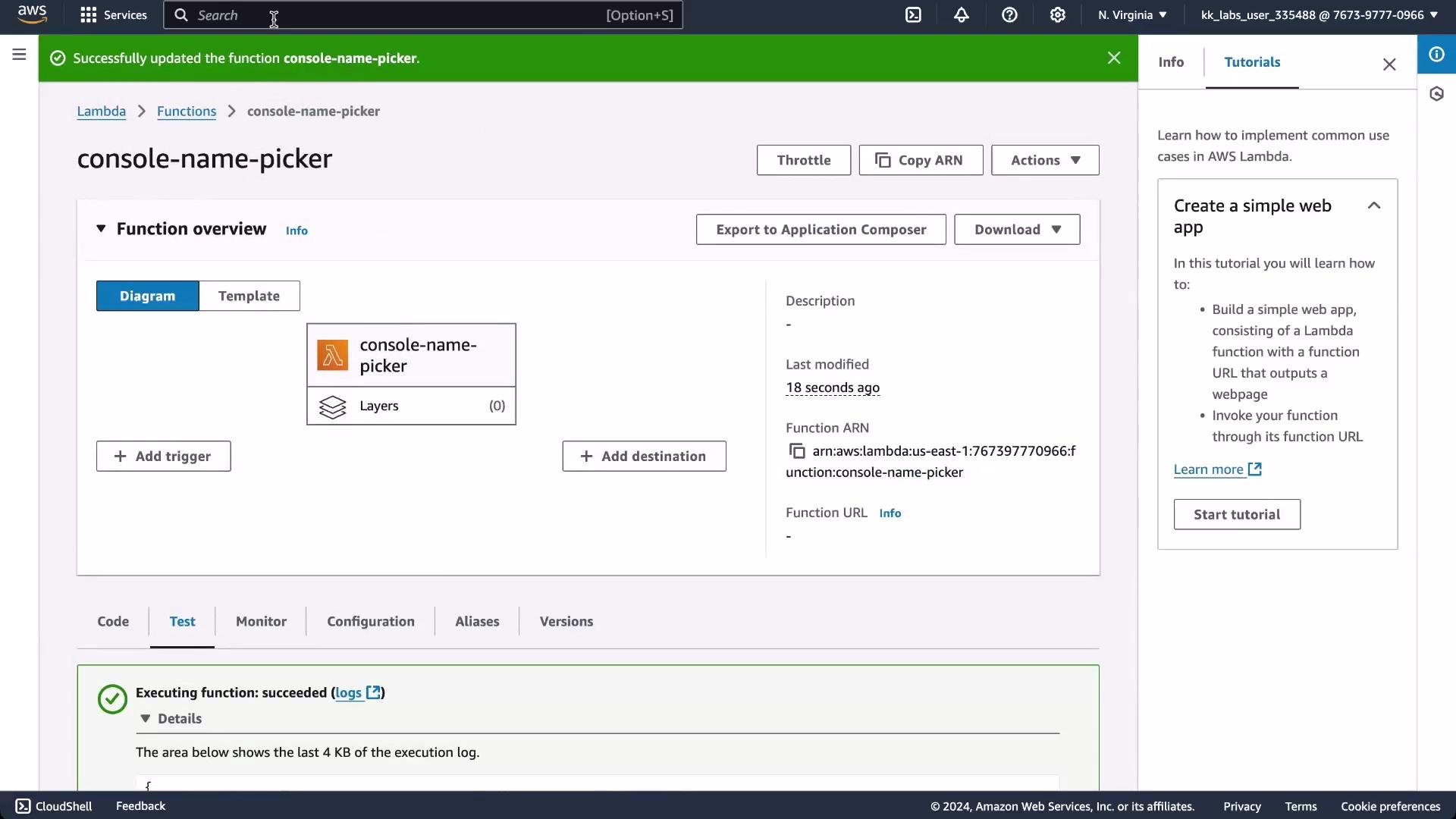 A screenshot of the AWS Lambda console showing the function "console-name-picker" with its overview diagram, ARN and execution status. A green banner at the top indicates the function was successfully updated.