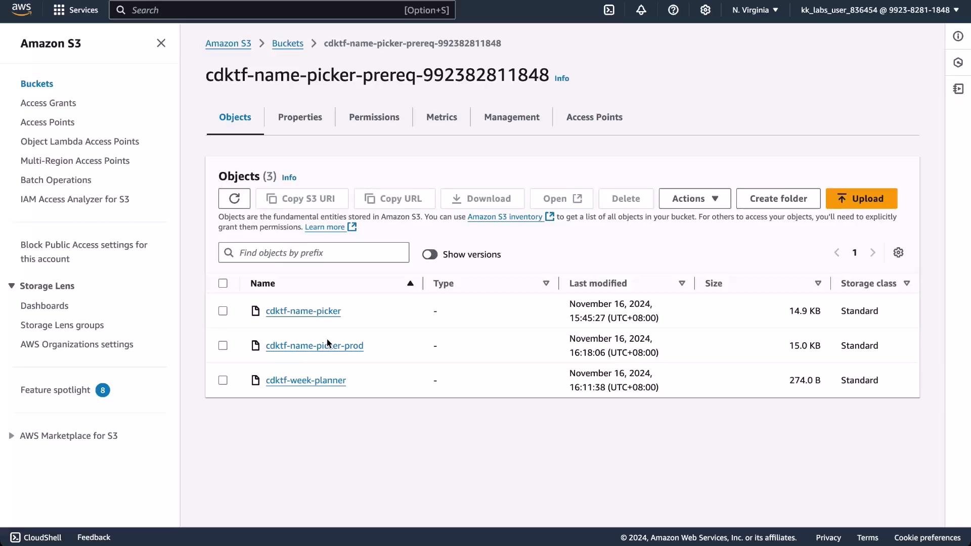 A screenshot of the Amazon S3 console showing the bucket "cdktf-name-picker-prereq-992382811848" with three objects listed (cdktf-name-picker, cdktf-name-picker-prod, cdktf-week-planner) and controls like Upload, Create folder, and Copy URL. The page also shows object sizes, last-modified timestamps, and the S3 navigation sidebar.