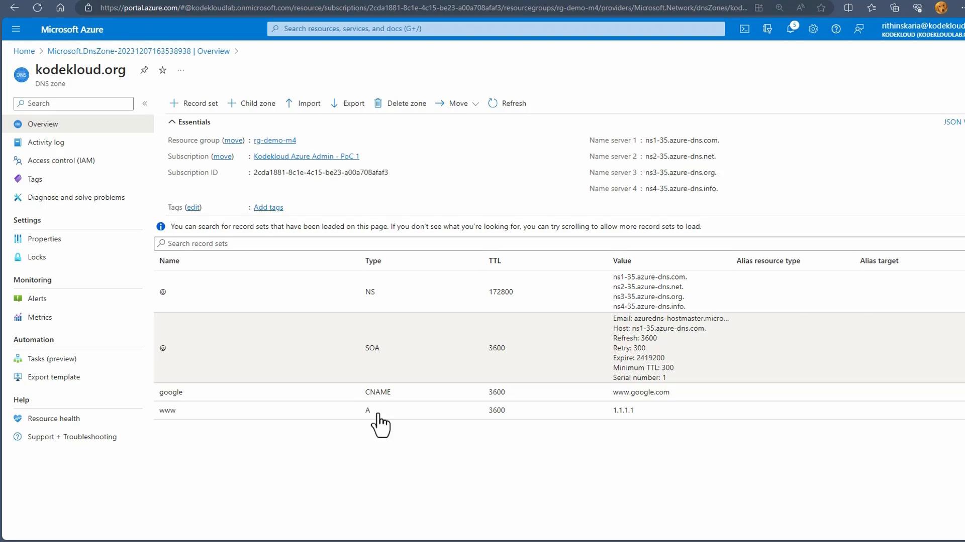 A screenshot of the Microsoft Azure portal showing the DNS zone "kodekloud.org" overview, including essentials and a list of DNS record sets (NS, SOA, CNAME, A) with name server entries and record values. A cursor hand is pointing at the A record for "www" with value 1.1.1.1.