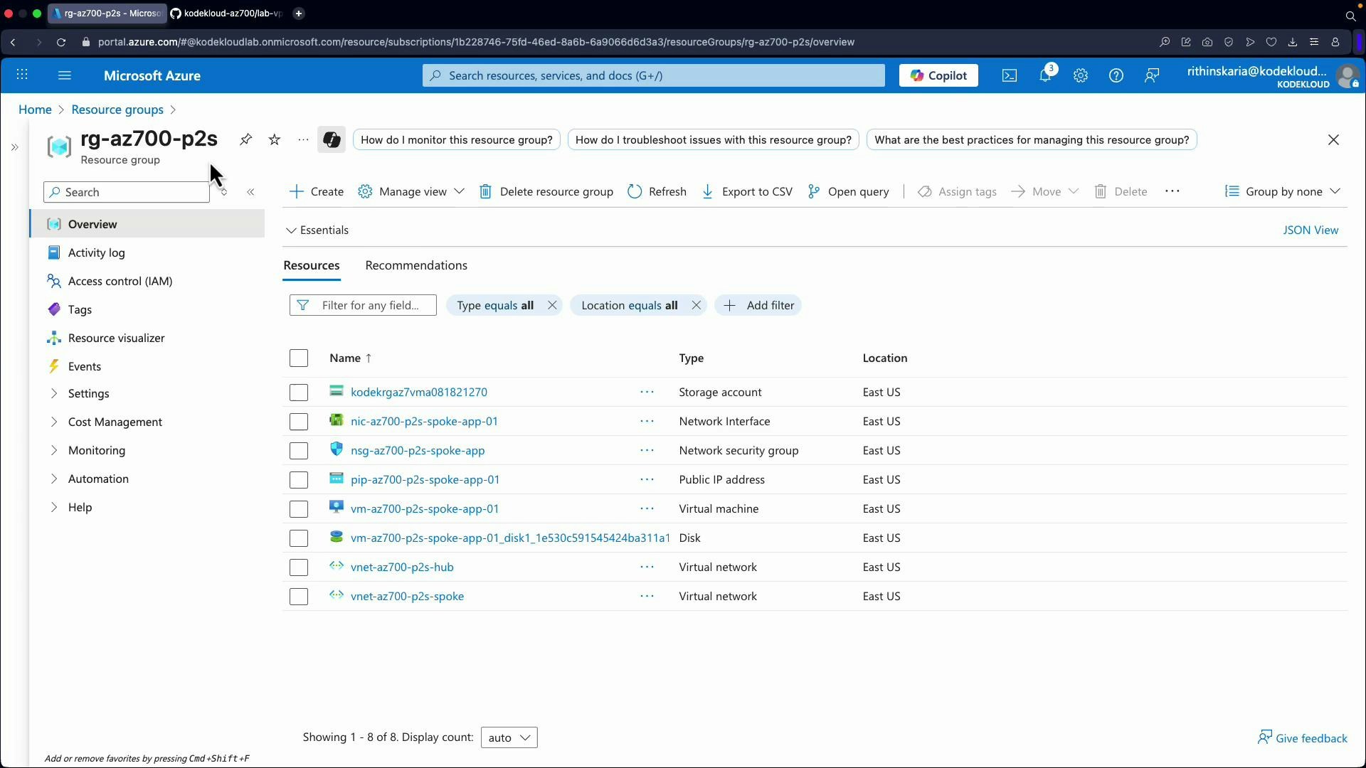 A screenshot of the Microsoft Azure portal showing the "rg-az700-p2s" resource group Overview page with a list of resources (storage account, network interface, VM, public IP, virtual networks, etc.), their types, and locations (all East US). The left navigation menu and top action bar (Create, Delete resource group, Refresh, Export) are also visible.
