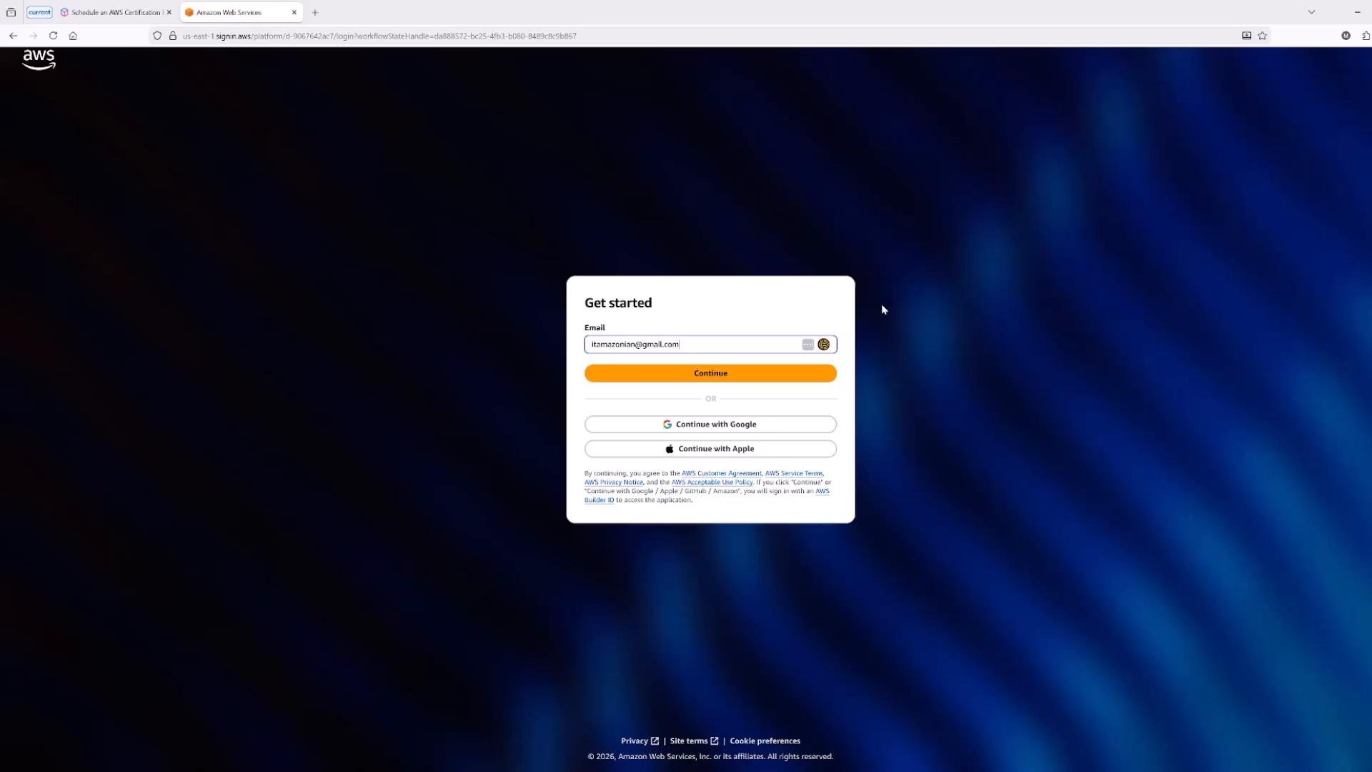 A web browser screenshot of the Amazon Web Services sign-in page showing a centered "Get started" form with an email field and Continue / Continue with Google / Continue with Apple buttons on a dark blue background.