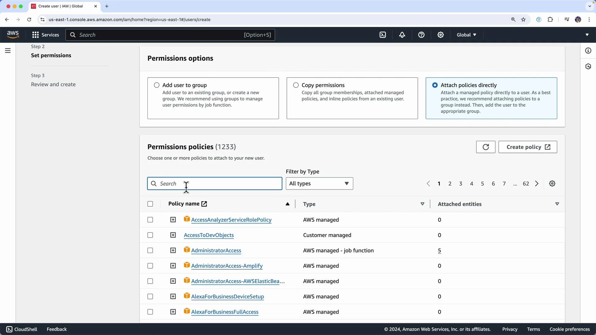 The image shows the AWS IAM (Identity and Access Management) console where a user is setting permissions by selecting policy options. There's a section for permission policies with various listed policies that can be attached to a new user.