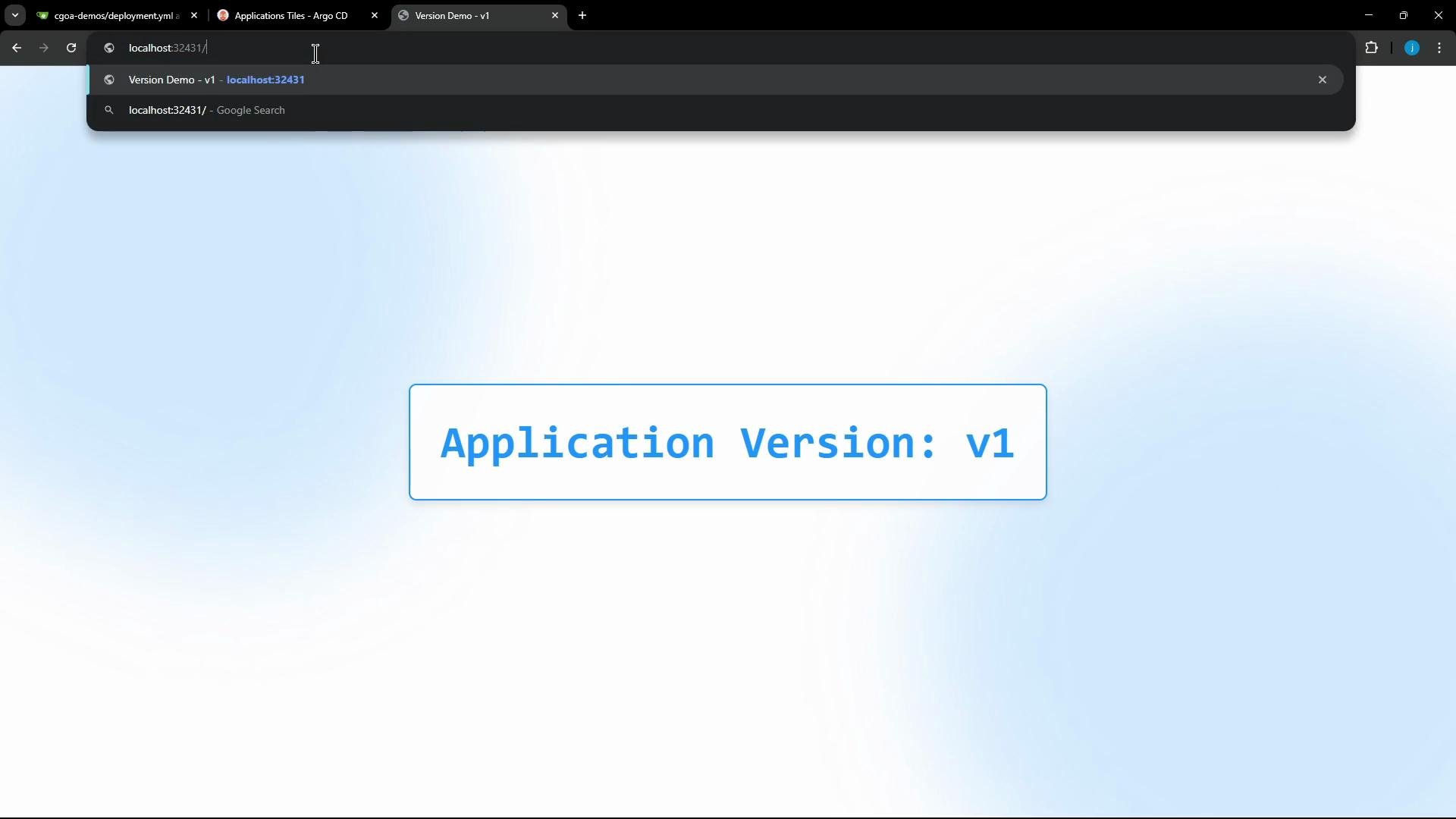 A web browser window displaying a centered banner that reads "Application Version: v1" in large blue text inside a rounded, blue-outlined box on a light blue gradient background. The address bar shows a localhost URL.