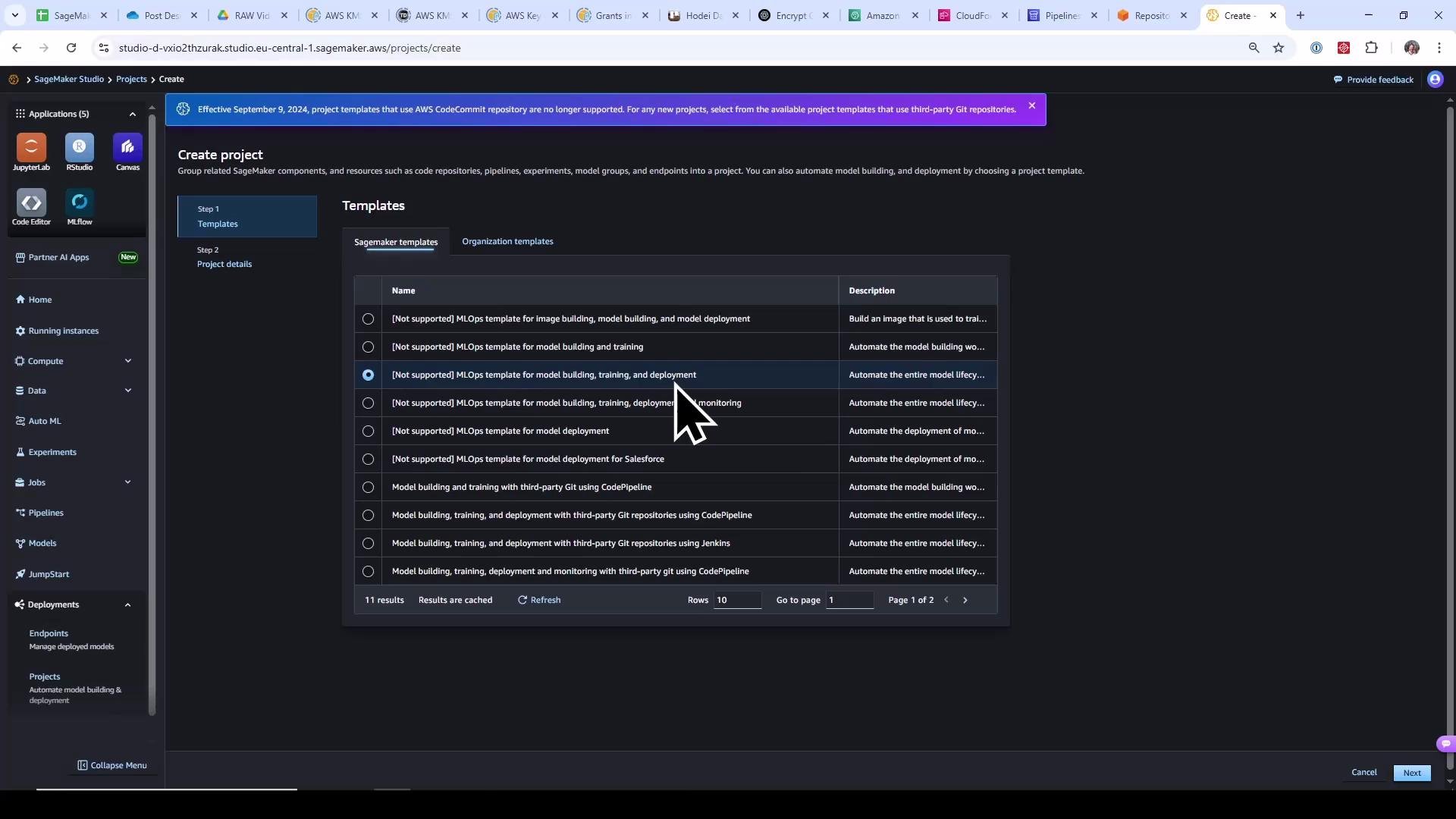 A screenshot of the AWS SageMaker Studio "Create project" page showing a list of MLOps project templates (one highlighted) and a large left navigation sidebar with tools like JupyterLab and RStudio. A cursor is visible over the selected template.