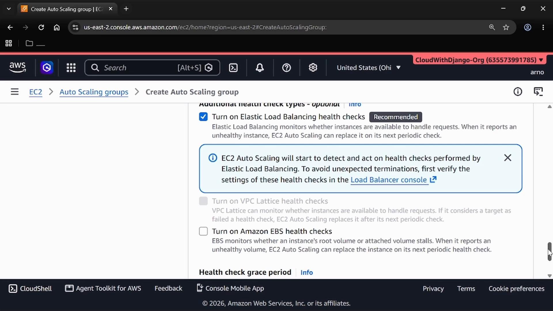 A screenshot of the AWS EC2 "Create Auto Scaling group" page showing health-check options. The "Turn on Elastic Load Balancing health checks" box is checked and a blue info notice explains how Auto Scaling uses load balancer health checks.