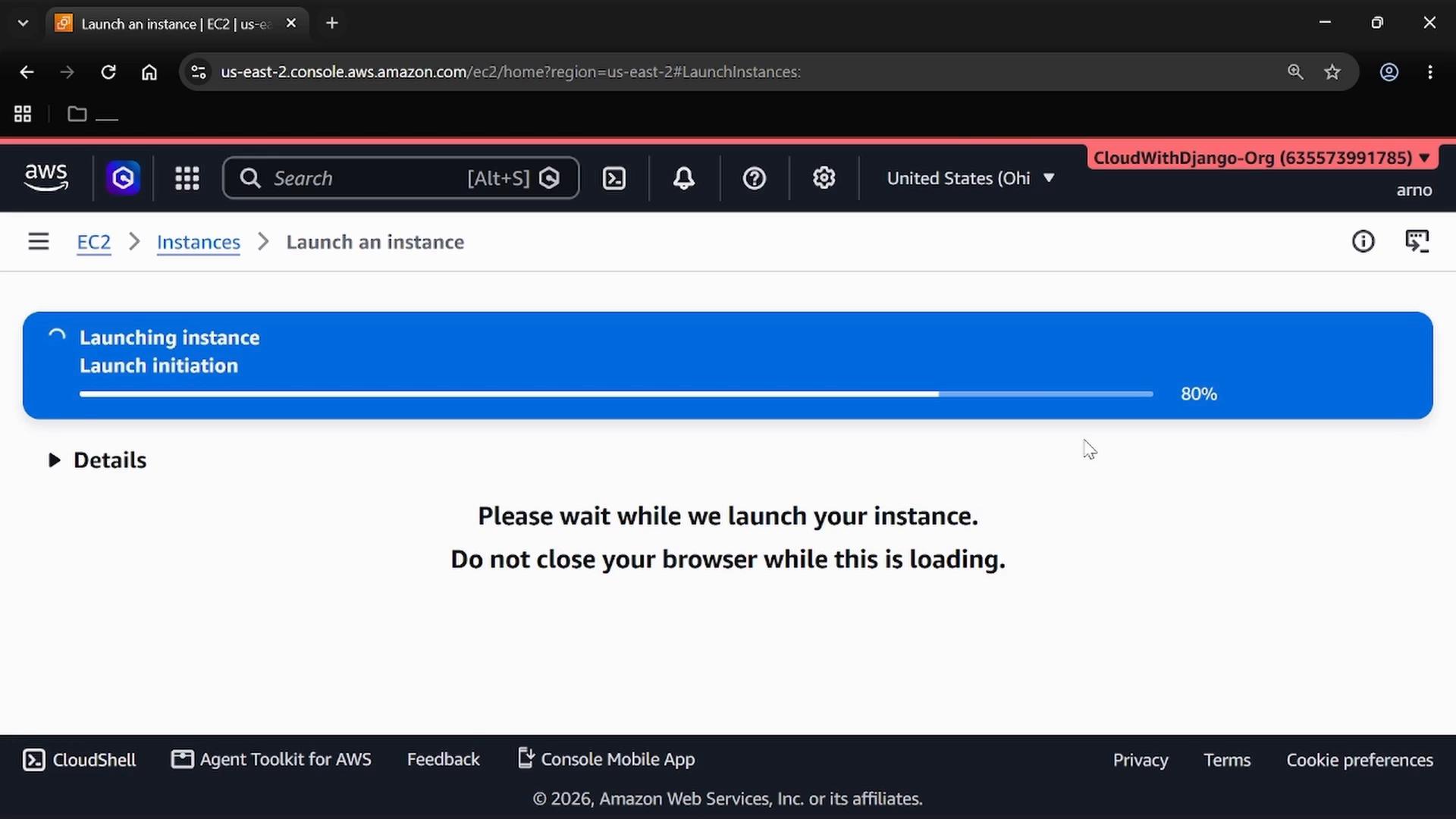 A web browser screenshot of the AWS EC2 "Launch an instance" page showing a blue progress bar at 80% for "Launch initiation." Below it is a message asking the user to wait and not close the browser while the instance is launching.