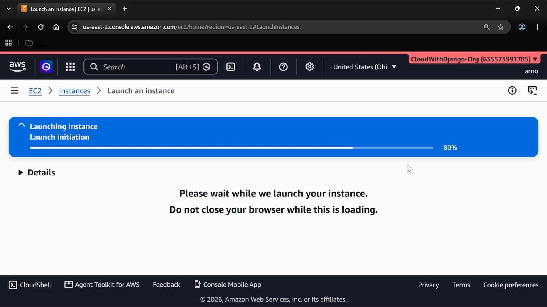 A web browser screenshot of the AWS EC2 "Launch an instance" page showing a blue progress bar at 80% for "Launch initiation." Below it is a message asking the user to wait and not close the browser while the instance is launching.
