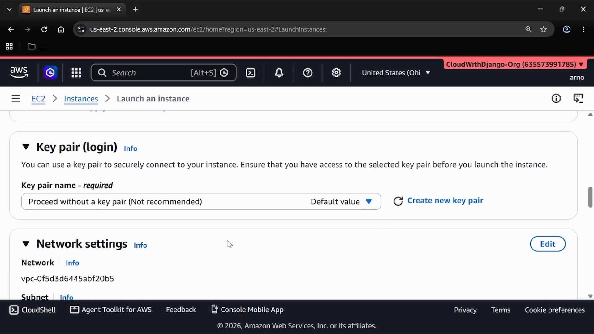 A screenshot of the AWS EC2 "Launch an instance" console showing the Key pair (login) section with the option "Proceed without a key pair (Not recommended)" and part of the Network settings.
