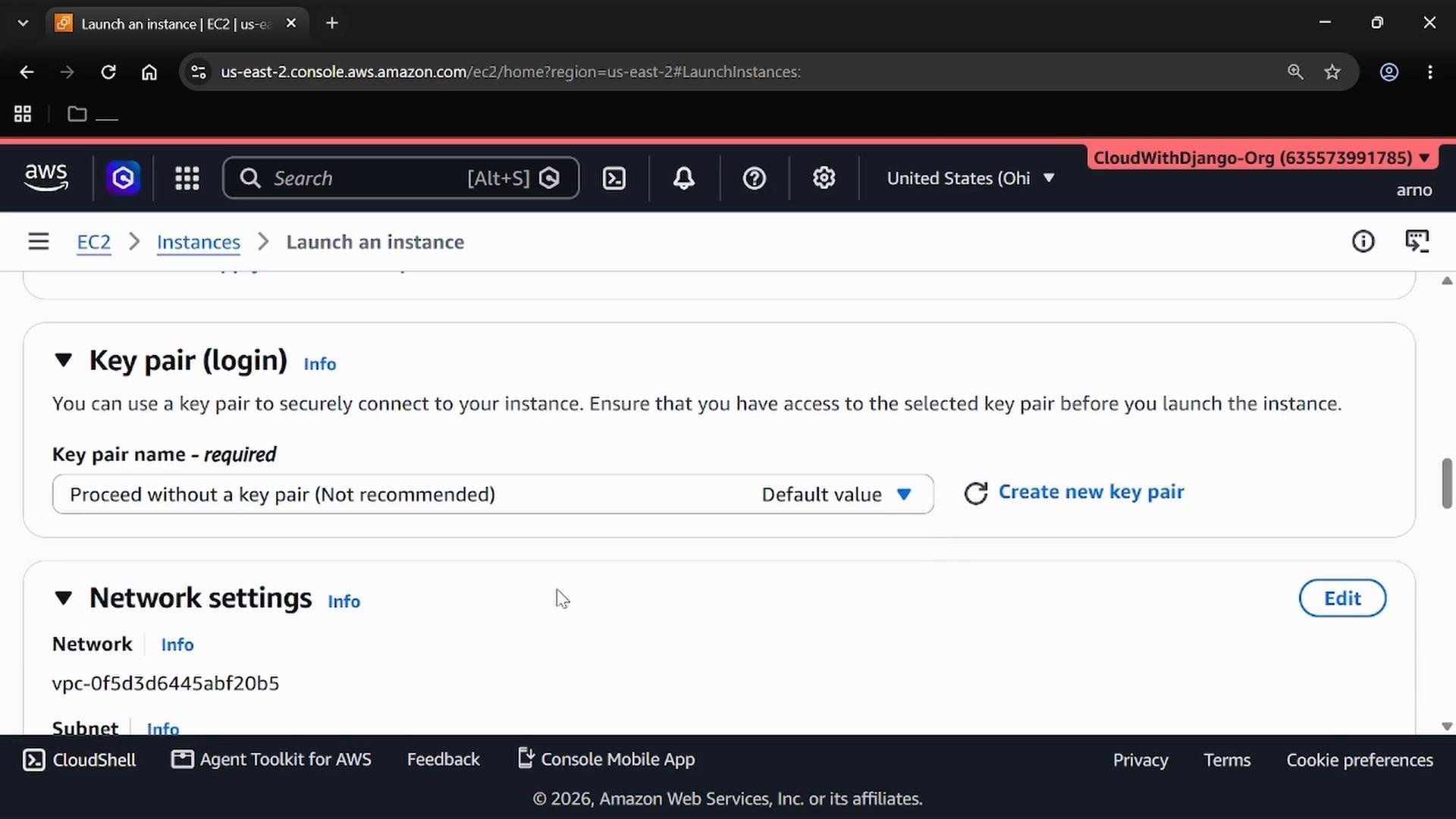 A screenshot of the AWS EC2 "Launch an instance" console showing the Key pair (login) section with the option "Proceed without a key pair (Not recommended)" and part of the Network settings.