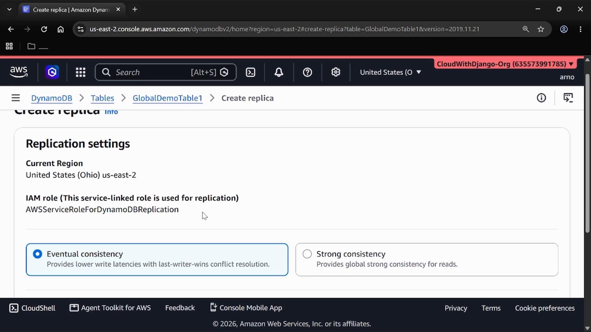 A screenshot of the AWS DynamoDB console on the "Create replica" replication settings page, showing the current region as United States (Ohio) us-east-2 and the IAM role AWSServ​iceRoleForDynamoDBReplication. The page shows consistency options with "Eventual consistency" selected and "Strong consistency" available.