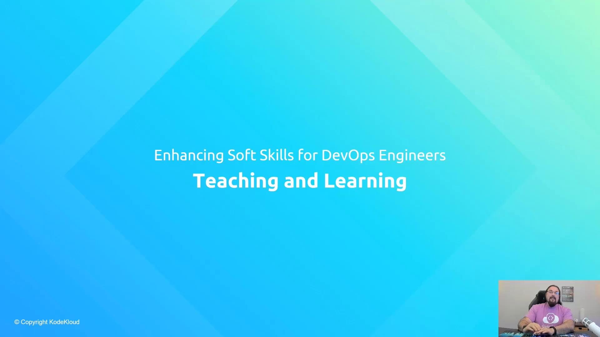 A blue presentation slide reading "Enhancing Soft Skills for DevOps Engineers — Teaching and Learning." A small webcam inset in the bottom-right shows a person speaking at a desk.