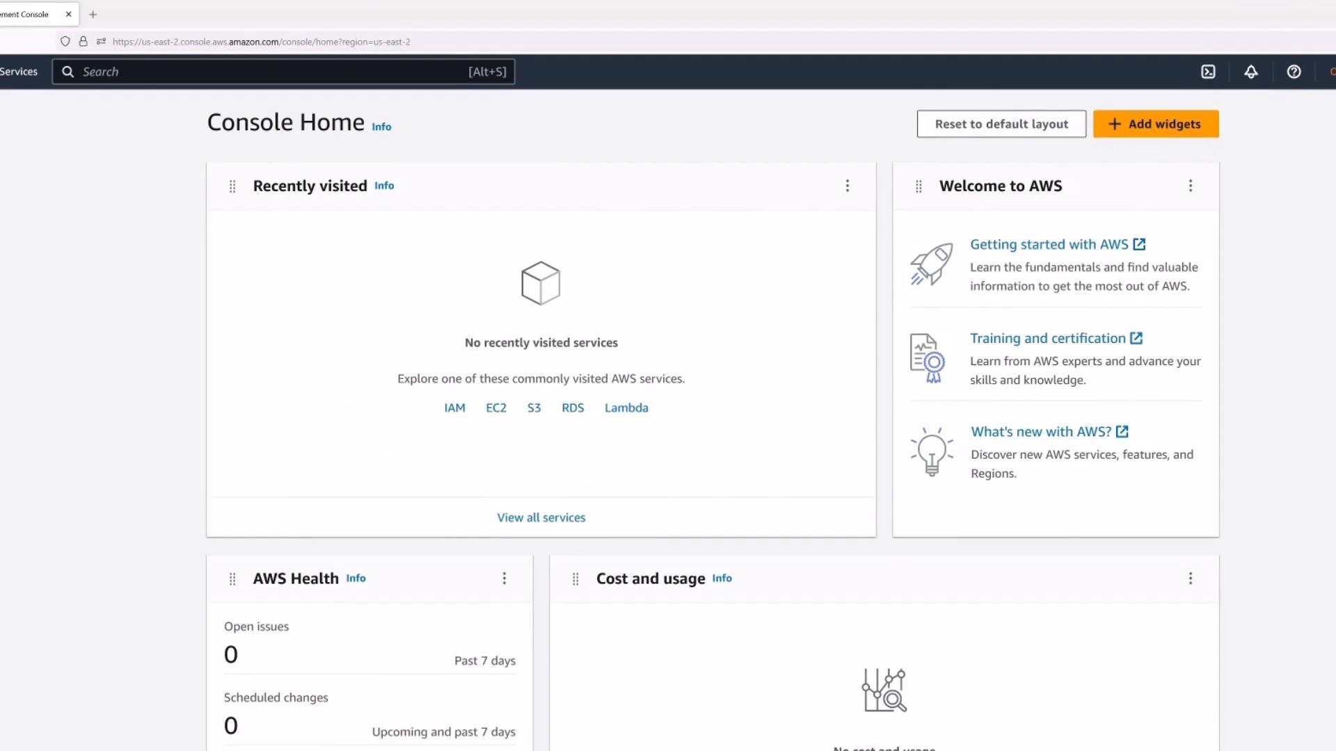 A screenshot of the AWS Management Console Home page showing dashboard widgets like "Recently visited," "Welcome to AWS," "AWS Health," and "Cost and usage." The top shows the console header and search bar.