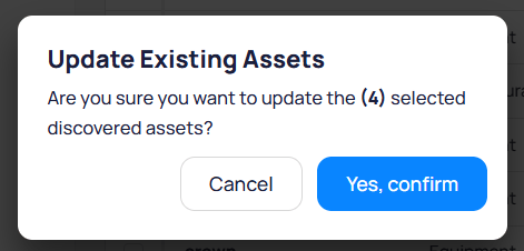 Update Existing Assets modal asking to confirm updating four selected discovered assets