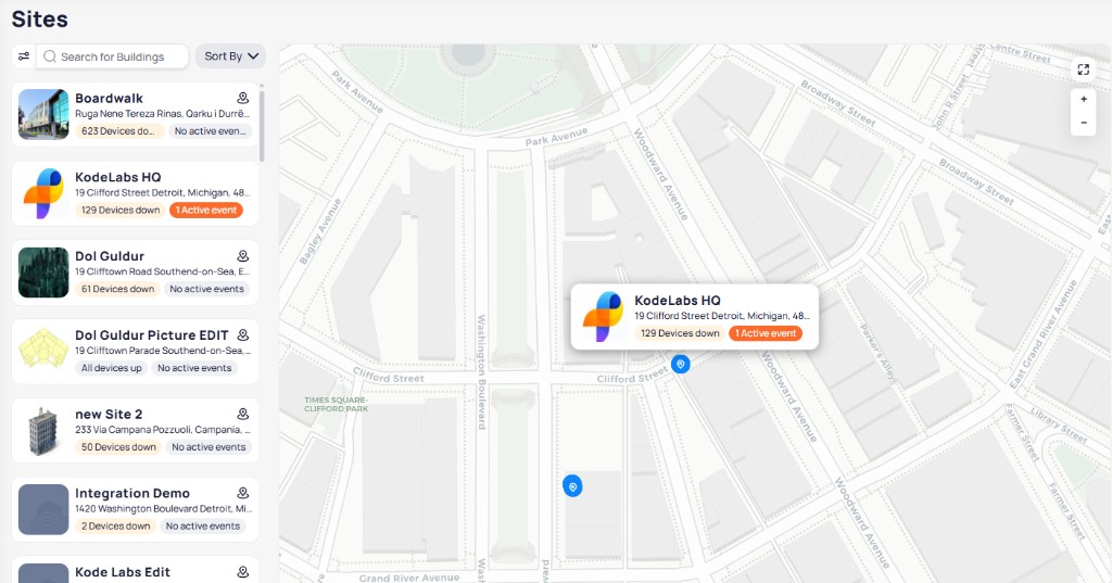 Map view zoomed into a building with a summary popup showing address and device status