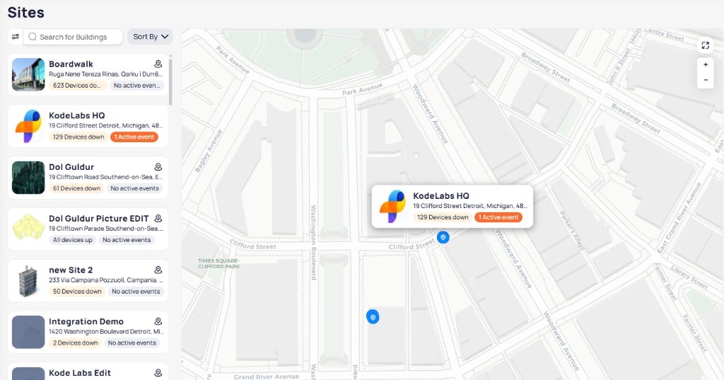 Map view zoomed into a building with a summary popup showing address and device status