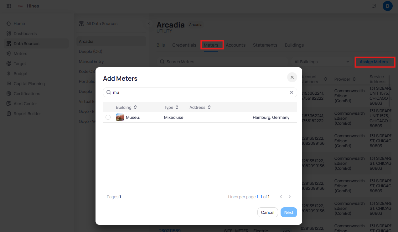 Add Meters dialog within the Arcadia Meters tab, showing a search field, a table with Building, Type, and Address columns, and Cancel and Next buttons