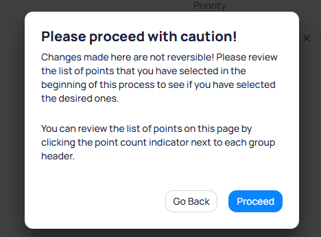 Caution dialog warning that changes are not reversible with Go Back and Proceed buttons