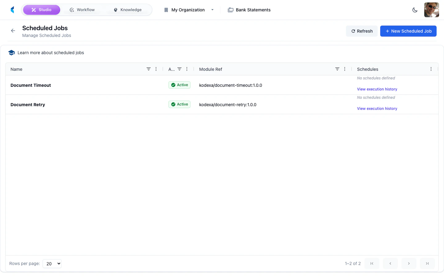 Scheduled Jobs page showing list of configured jobs with names, schedules, and status