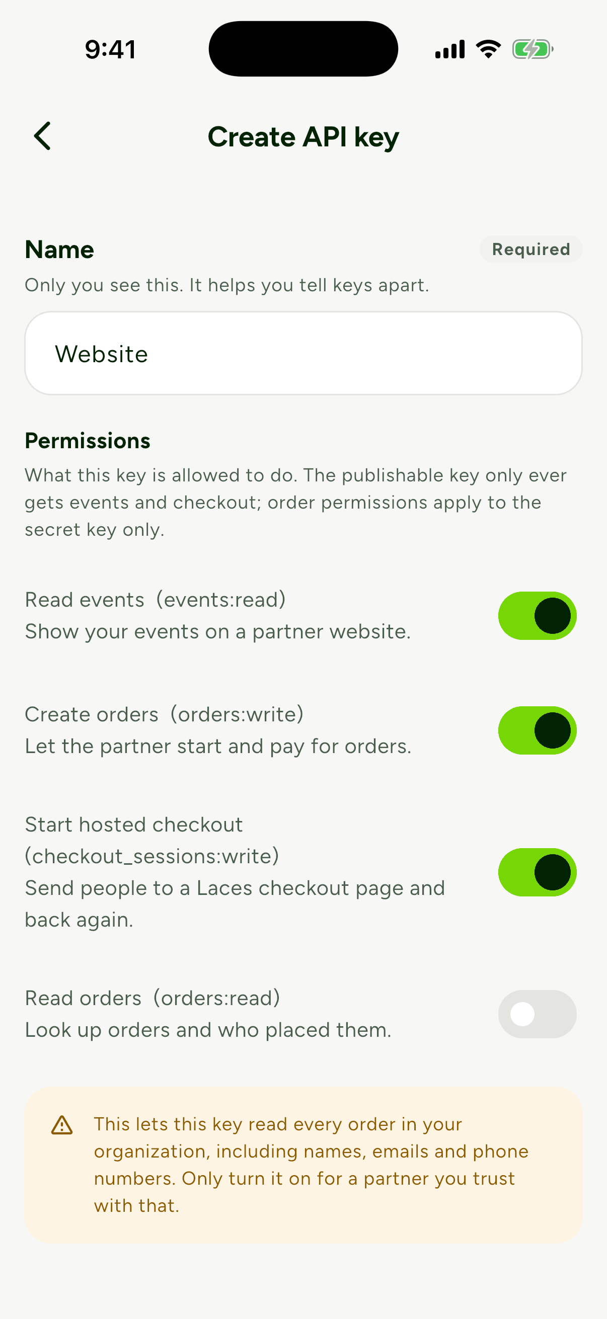 The Create API key form with the name Website, three permissions switched on and Read orders switched off, with a warning that Read orders exposes names, emails and phone numbers