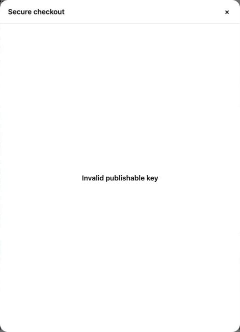 An empty Secure checkout modal with the message 'Invalid publishable key'