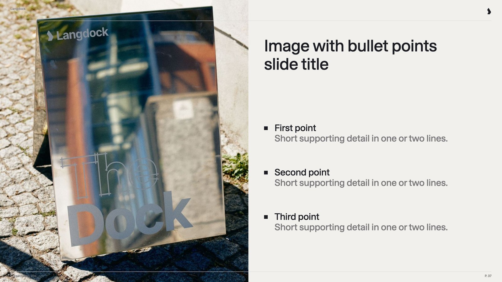Slide with a photo of a sign on the left half and a title with three bullet points on the right
