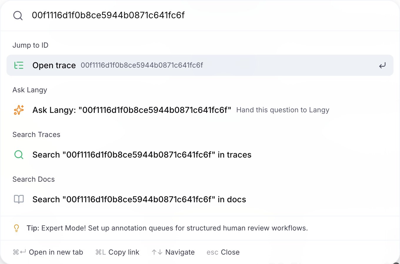 The command bar with a trace id pasted and the Open trace entry under Jump to ID