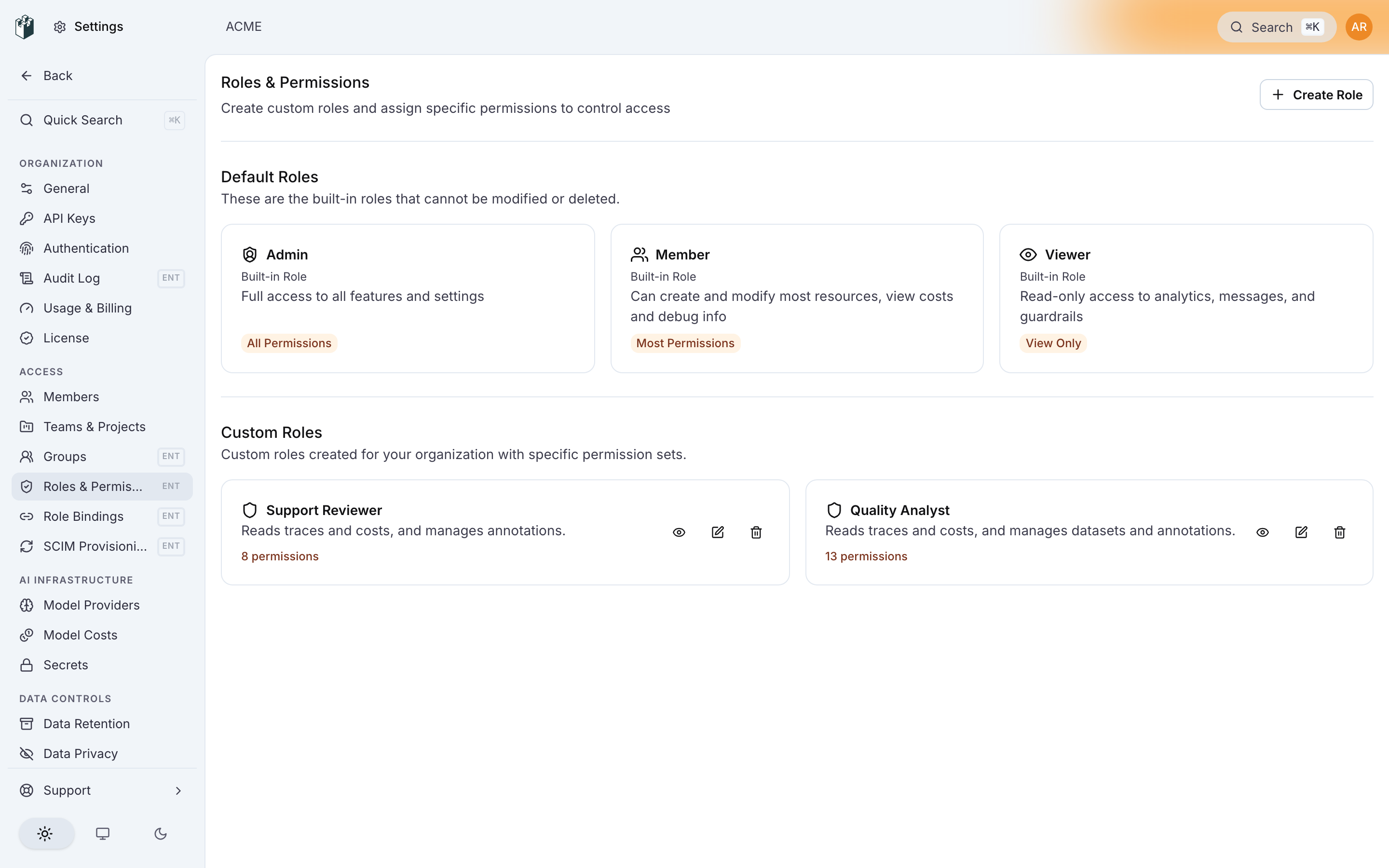 Settings > Roles & Permissions with the built-in roles and one custom role