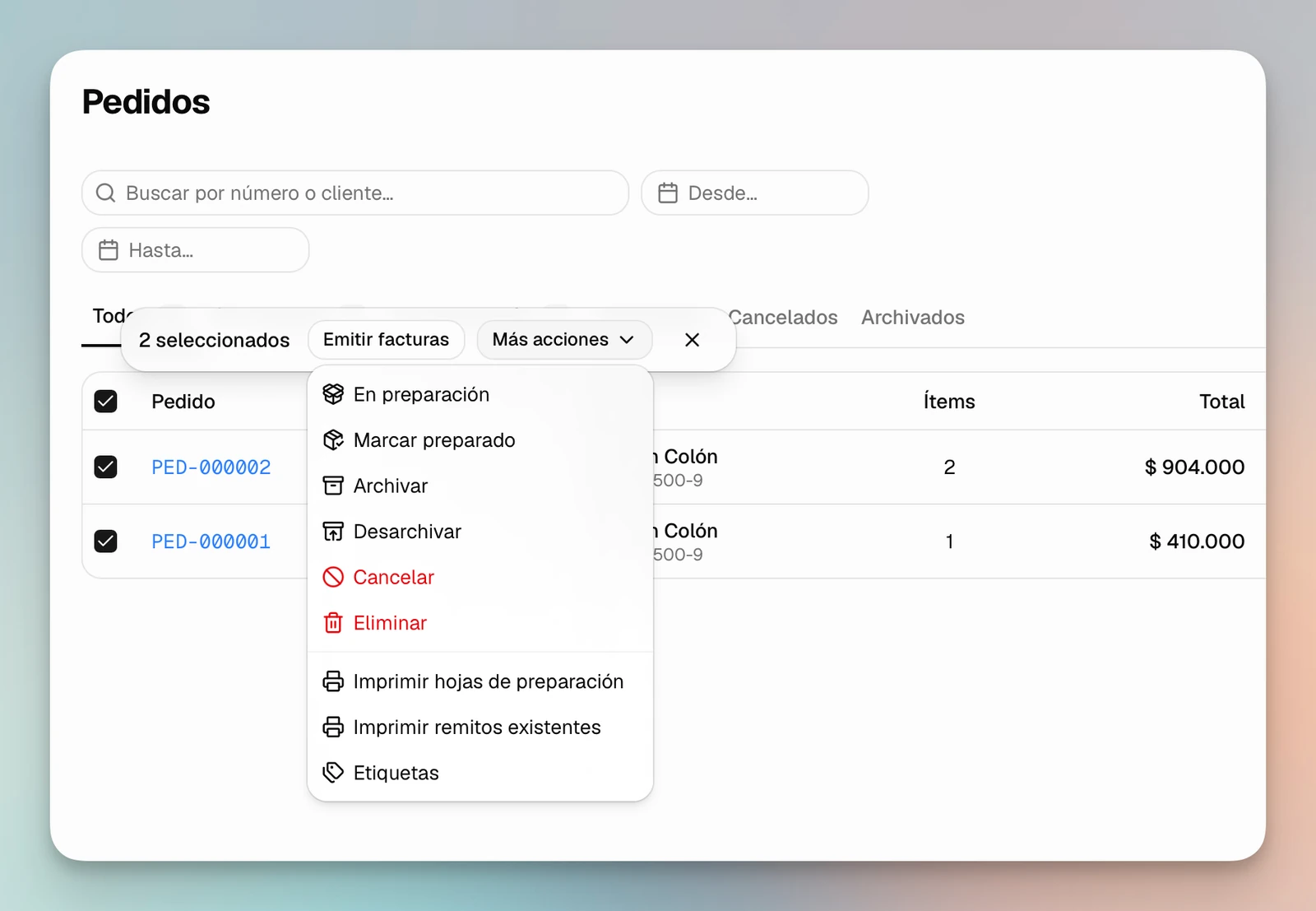 Listado de pedidos con dos pedidos seleccionados y el menú de acciones masivas para preparar, archivar e imprimir documentos