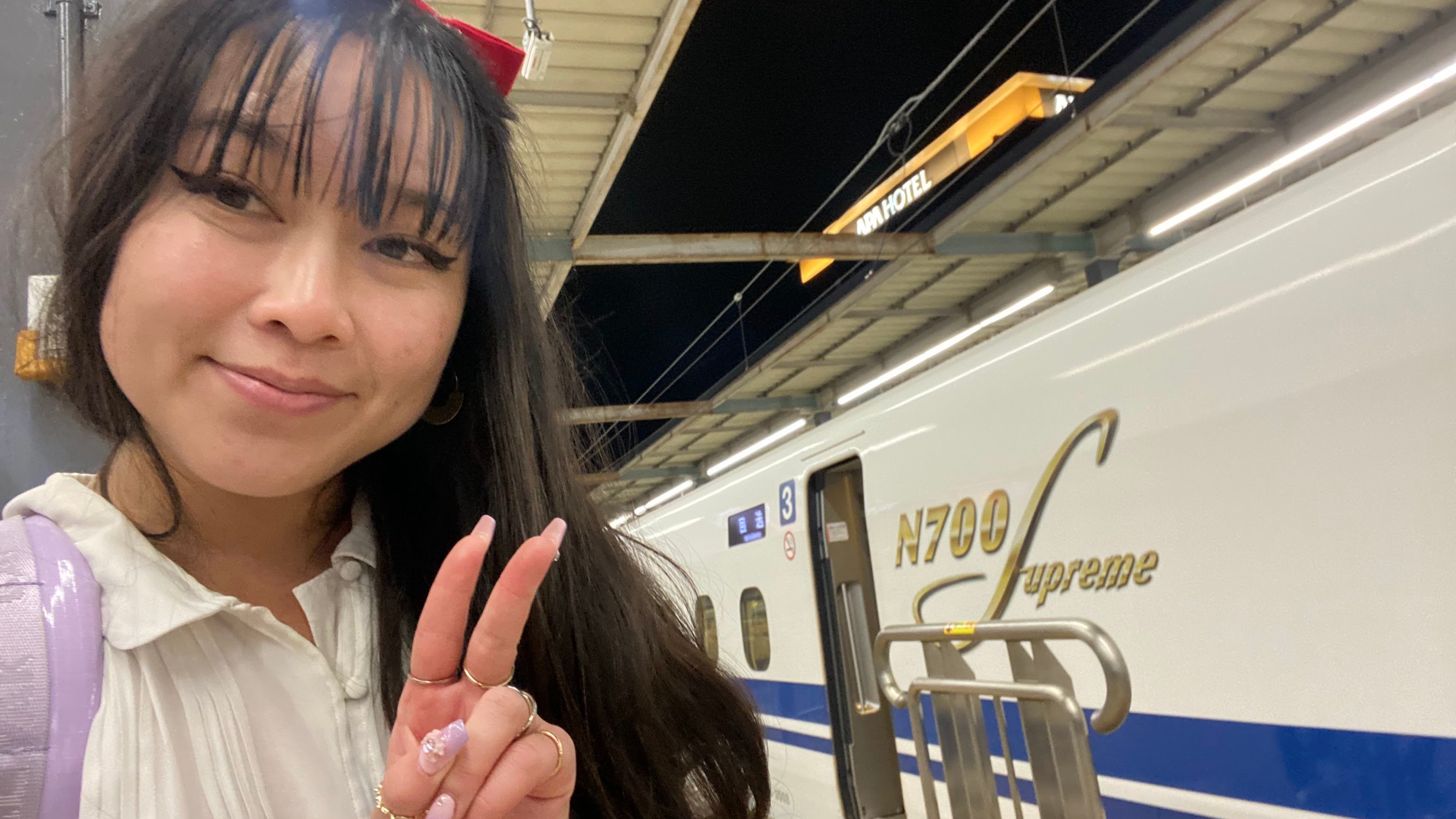 Photo of Diane next to the Shinkansen