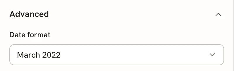 The Advanced group in Design mode, with a Date format dropdown set to March 2022.