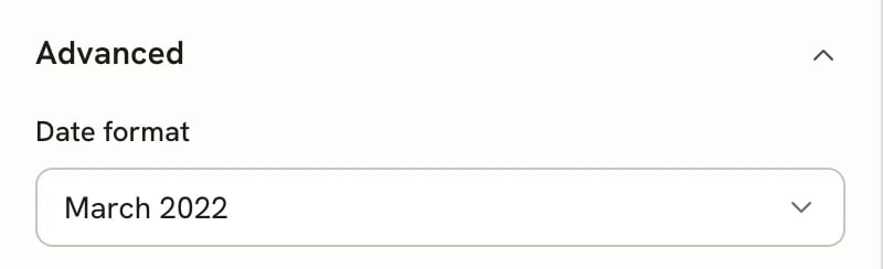 The Advanced group in Design mode, with a Date format dropdown set to March 2022.