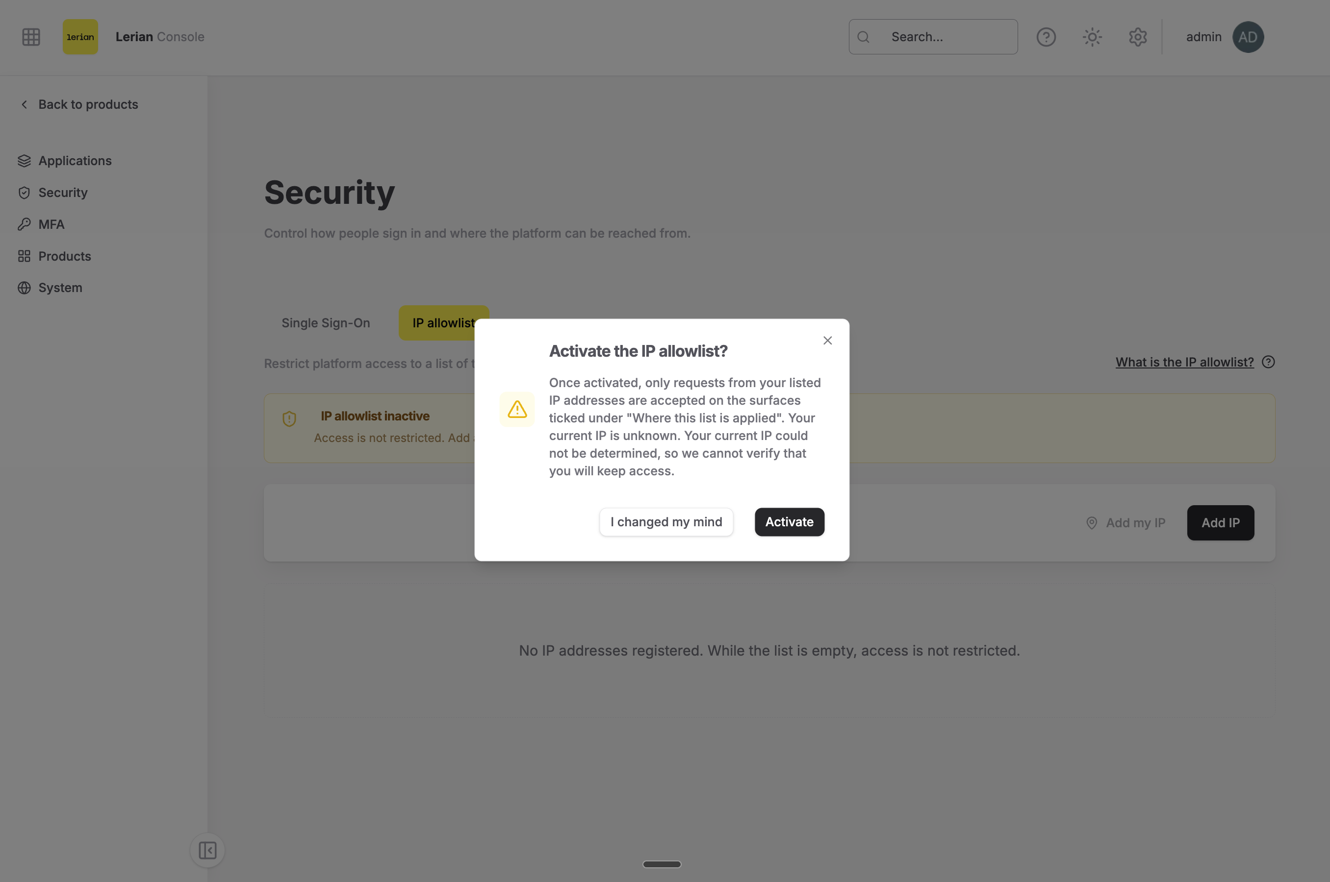 The dialog "Activate the IP allowlist?" over the Security page. The body explains that only listed addresses are accepted on the ticked surfaces and names the current IP. The buttons read "I changed my mind" and "Activate".