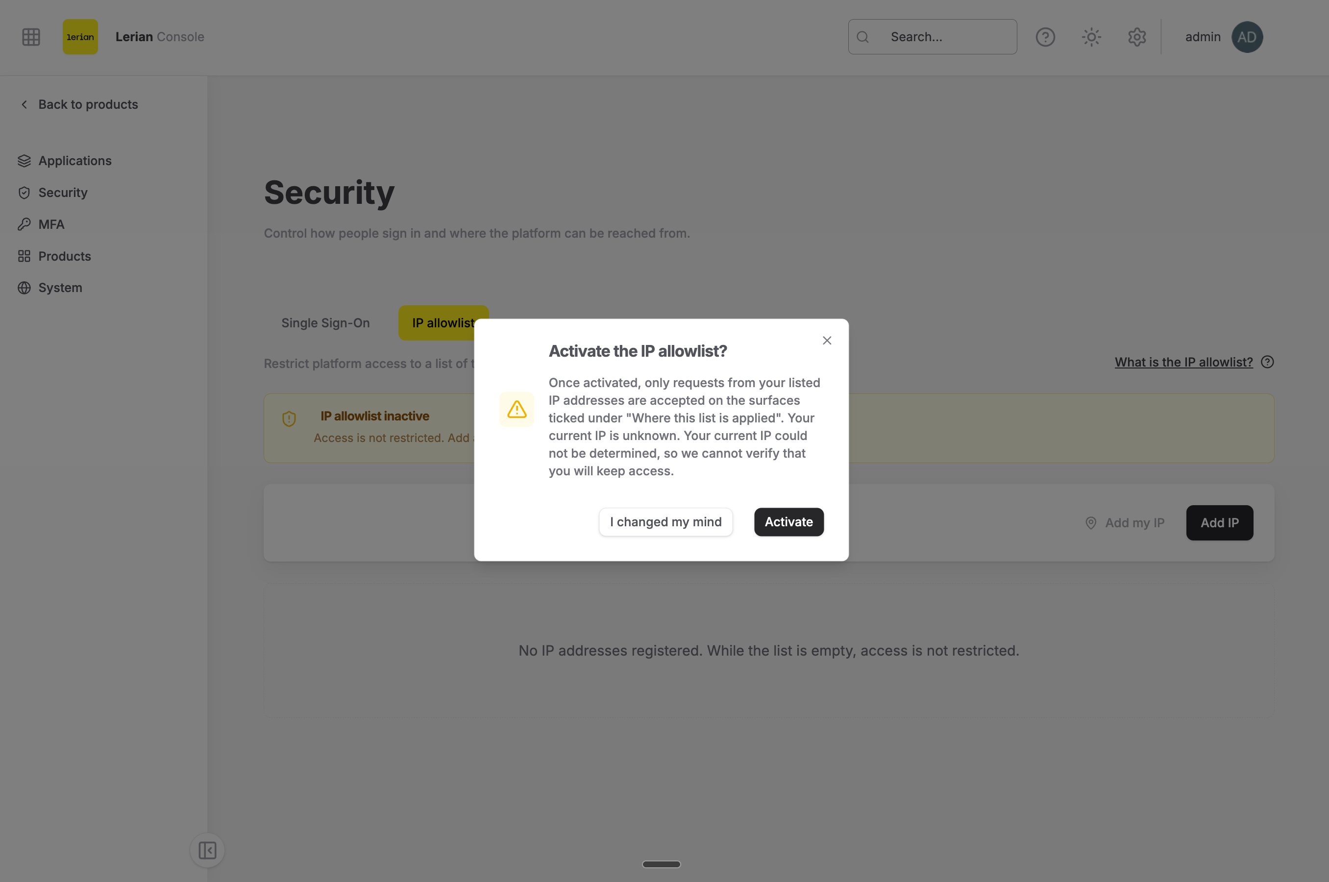 The dialog "Activate the IP allowlist?" over the Security page. The body explains that only listed addresses are accepted on the ticked surfaces and names the current IP. The buttons read "I changed my mind" and "Activate".