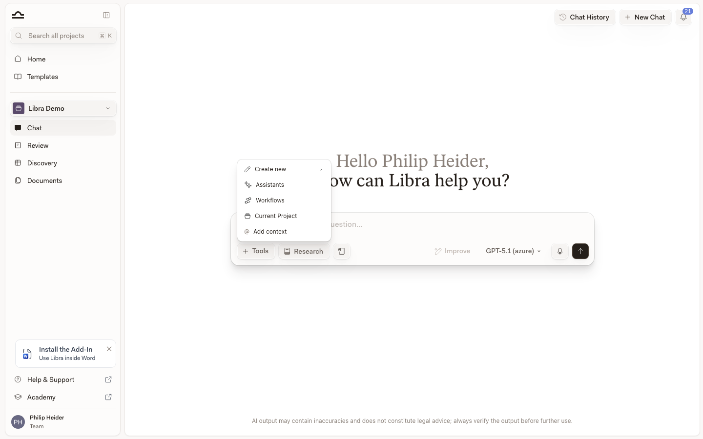 Tools menu open above the chat input, showing Create new, Assistants, Workflows, Search files and Add context