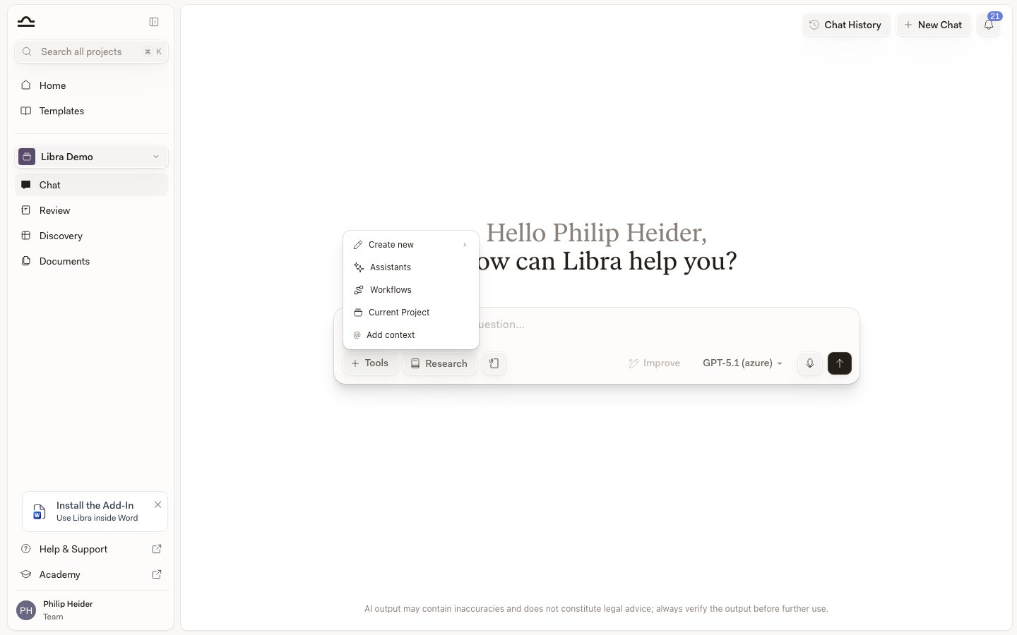 Tools menu open above the chat input, showing Create new, Assistants, Workflows, Search files and Add context